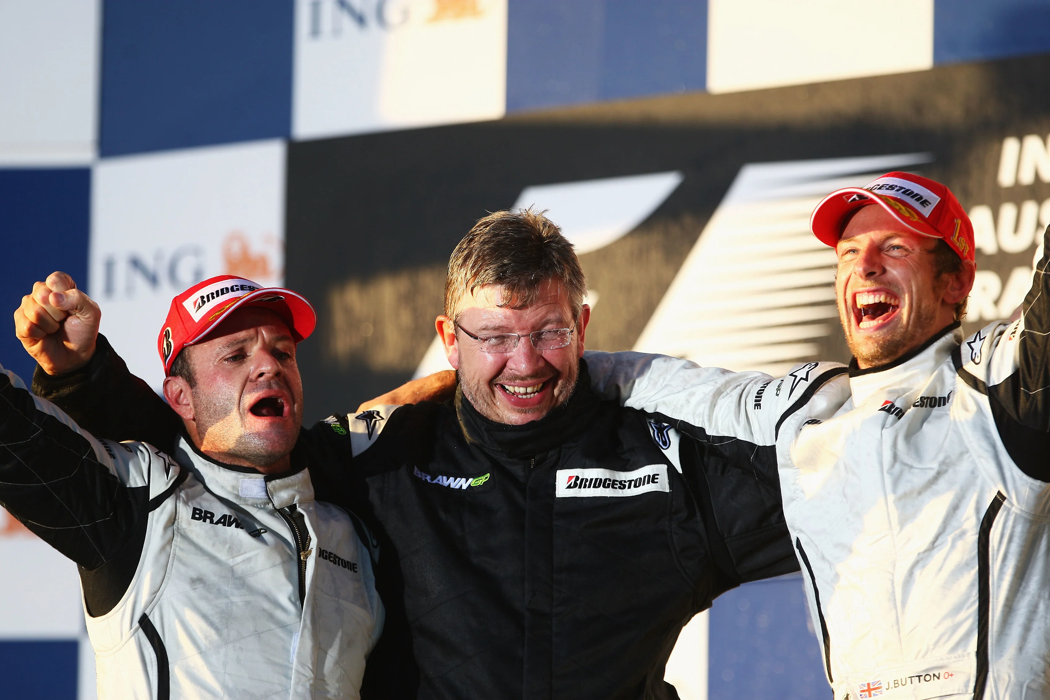 MELBOURNE, AUSTRALIA - MARCH 29: Race winner Jenson Button (R) of Great Britain and Brawn GP