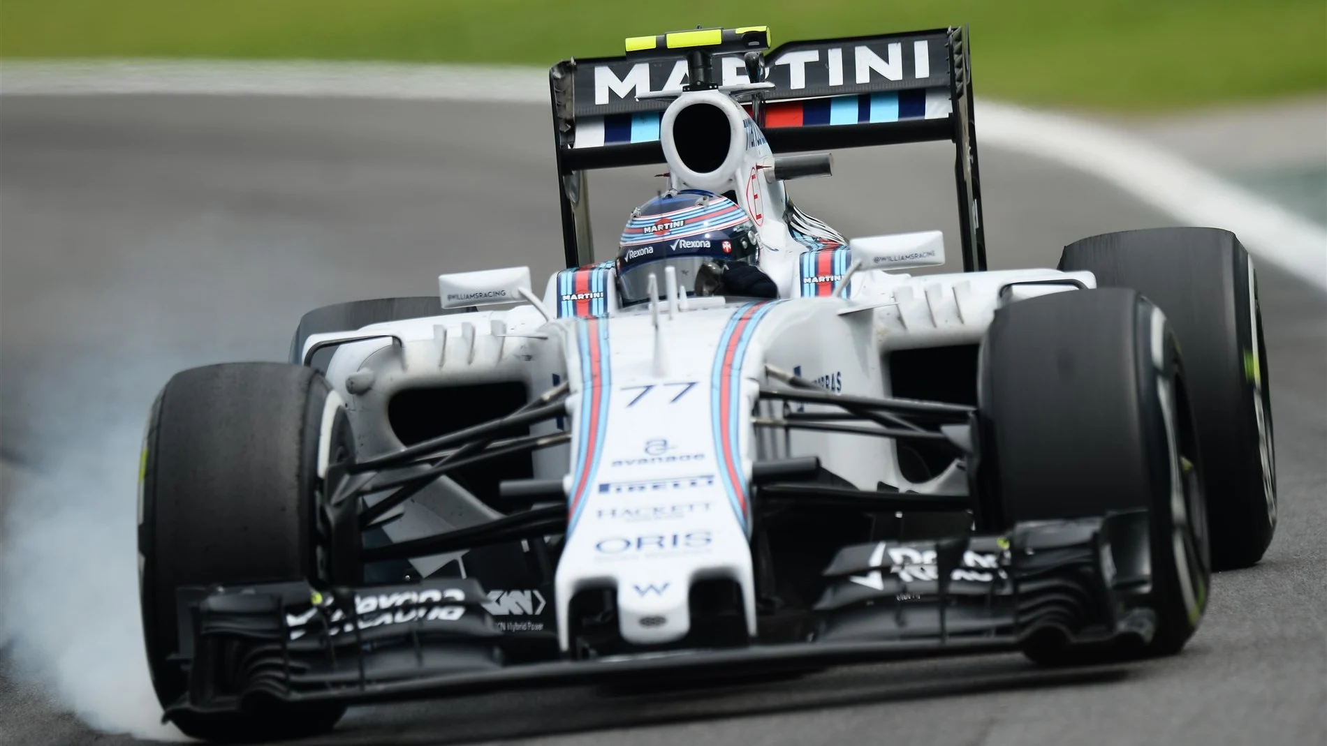Valtteri Bottas (FIN) Williams FW37 locks up at Formula One World Championship, Rd18, Brazilian