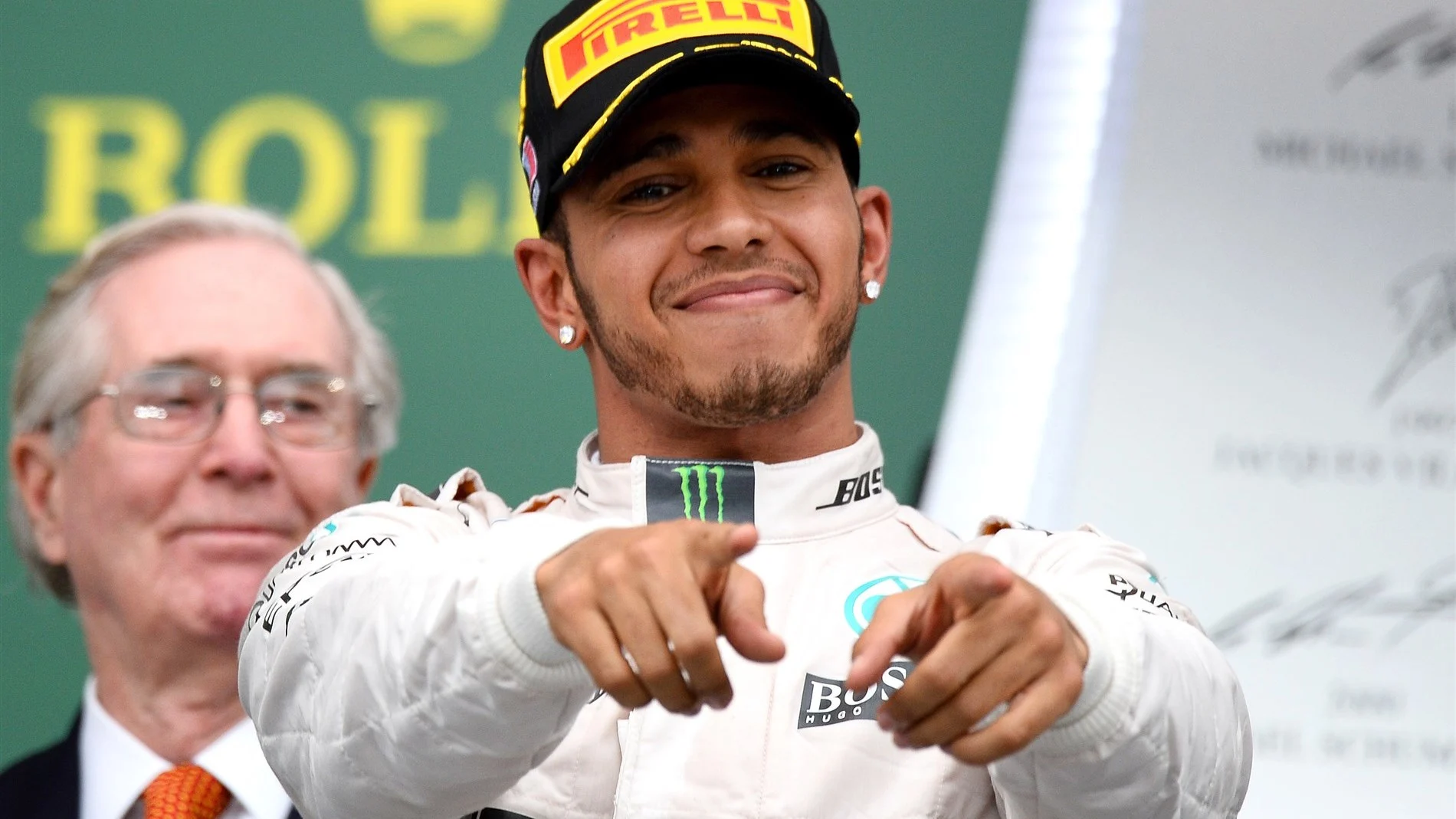 Race winner and new World Champion Lewis Hamilton (GBR) Mercedes AMG F1 celebrates on the podium at