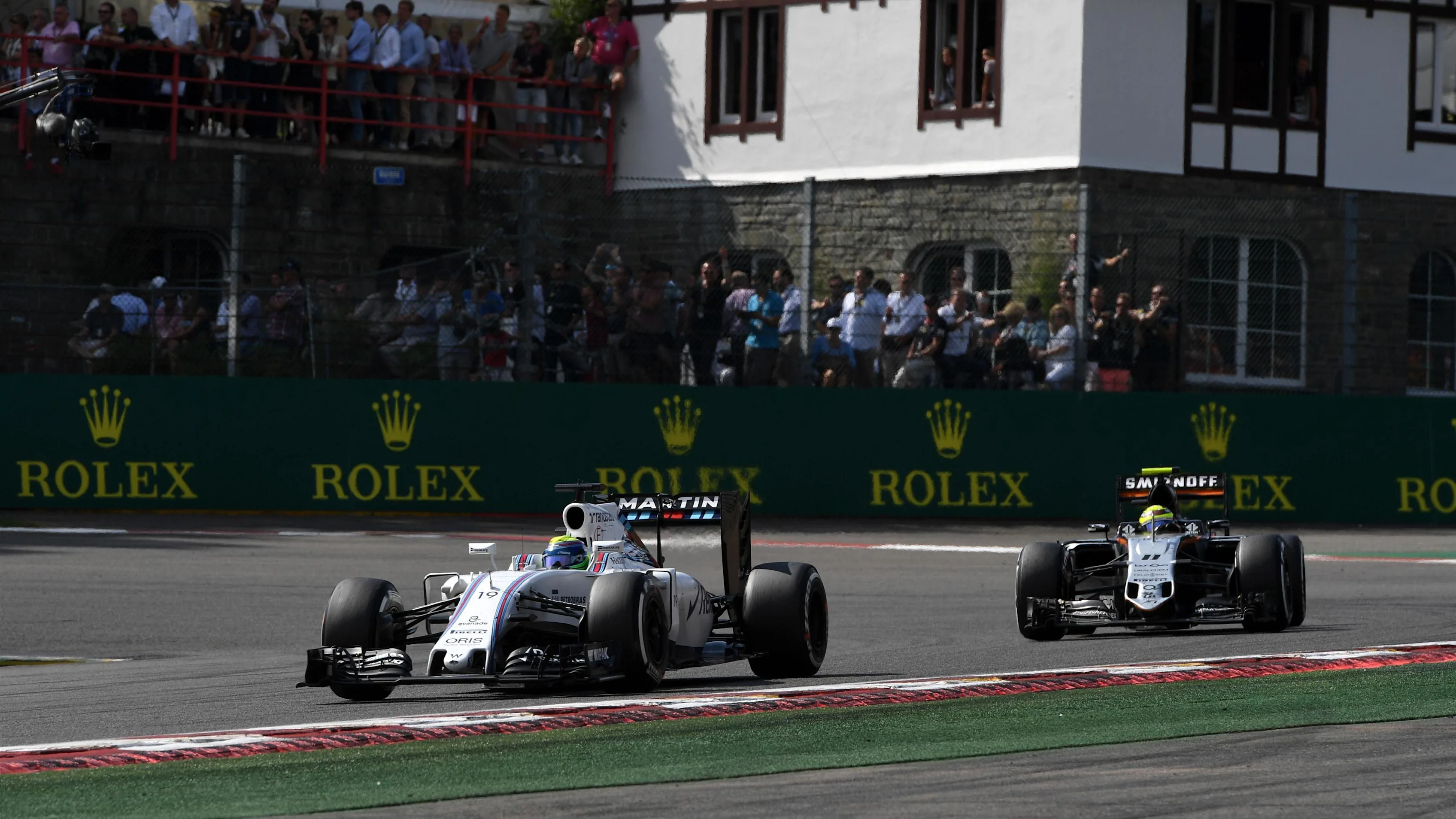 Felipe Massa (BRA) Williams FW38 and Sergio Perez (MEX) Force India VJM09 at Formula One World