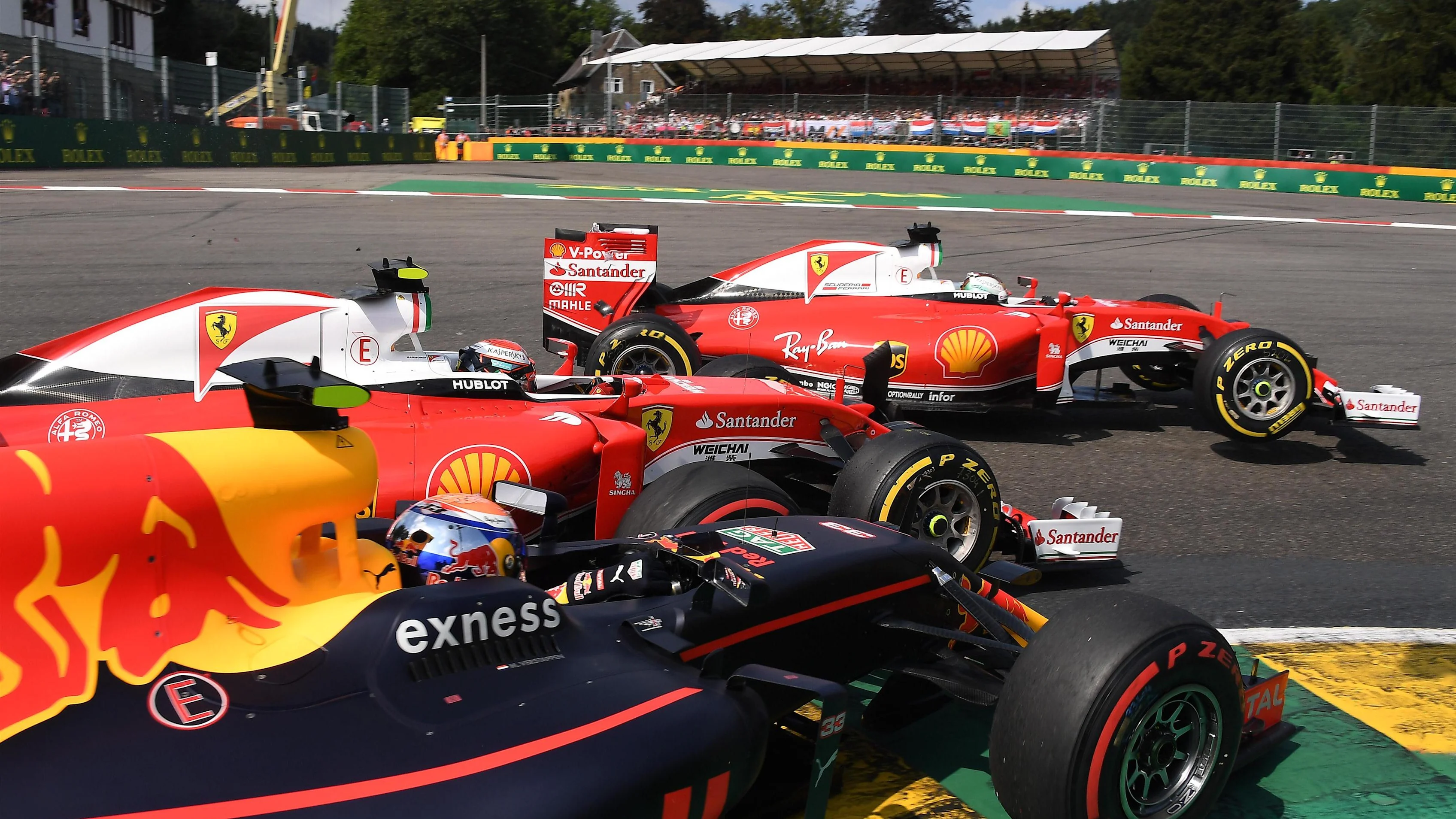 Max Verstappen (NED) Red Bull Racing RB12, Kimi Raikkonen (FIN) Ferrari SF16-H and Sebastian Vettel (GER) Ferrari SF16-H collide at the start of the race at Formula One World Championship, Rd13, Belgian Grand Prix, Race, Spa Francorchamps, Belgium, Sunday 28 August 2016. © Sutton Images