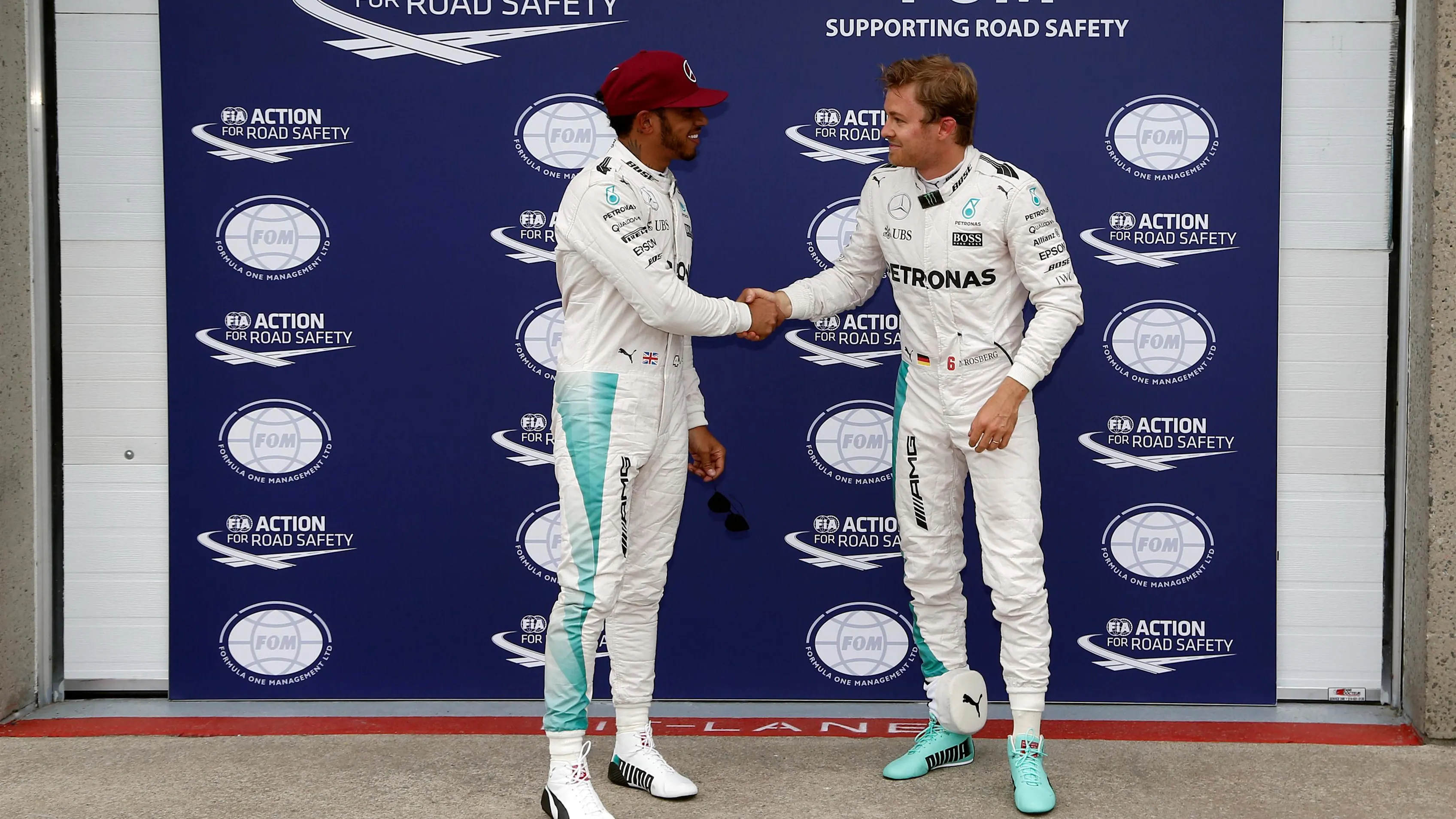 Pole sitter Lewis Hamilton (GBR) Mercedes AMG F1 and Nico Rosberg (GER) Mercedes AMG F1 celebrate in parc ferme at Formula One World Championship, Rd7, Canadian Grand Prix, Qualifying, Montreal, Canada, Saturday 11 June 2016. © Sutton Images