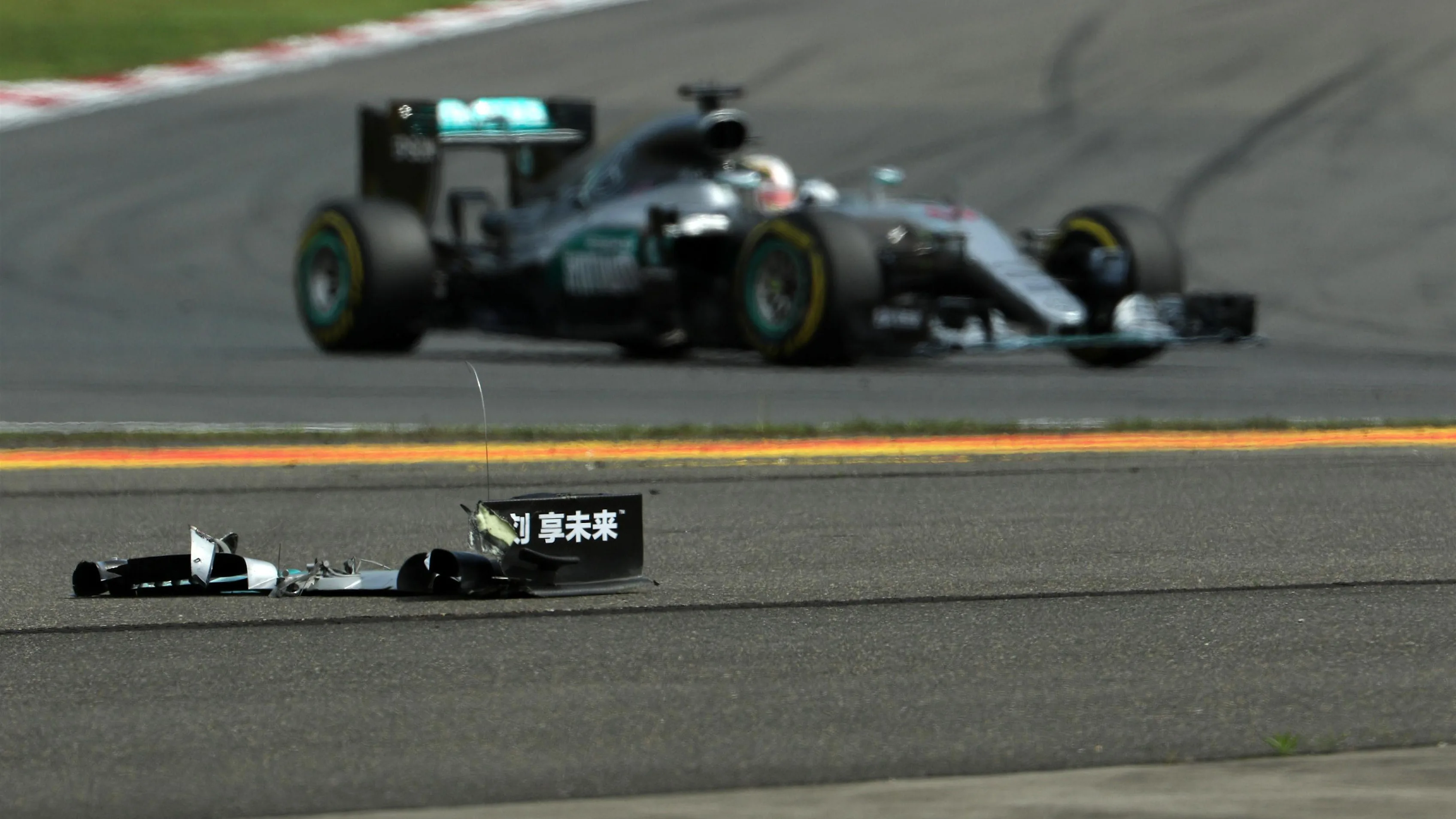 Lewis Hamilton (GBR) Mercedes-Benz F1 W07 Hybrid passes his front wing debris on the track at