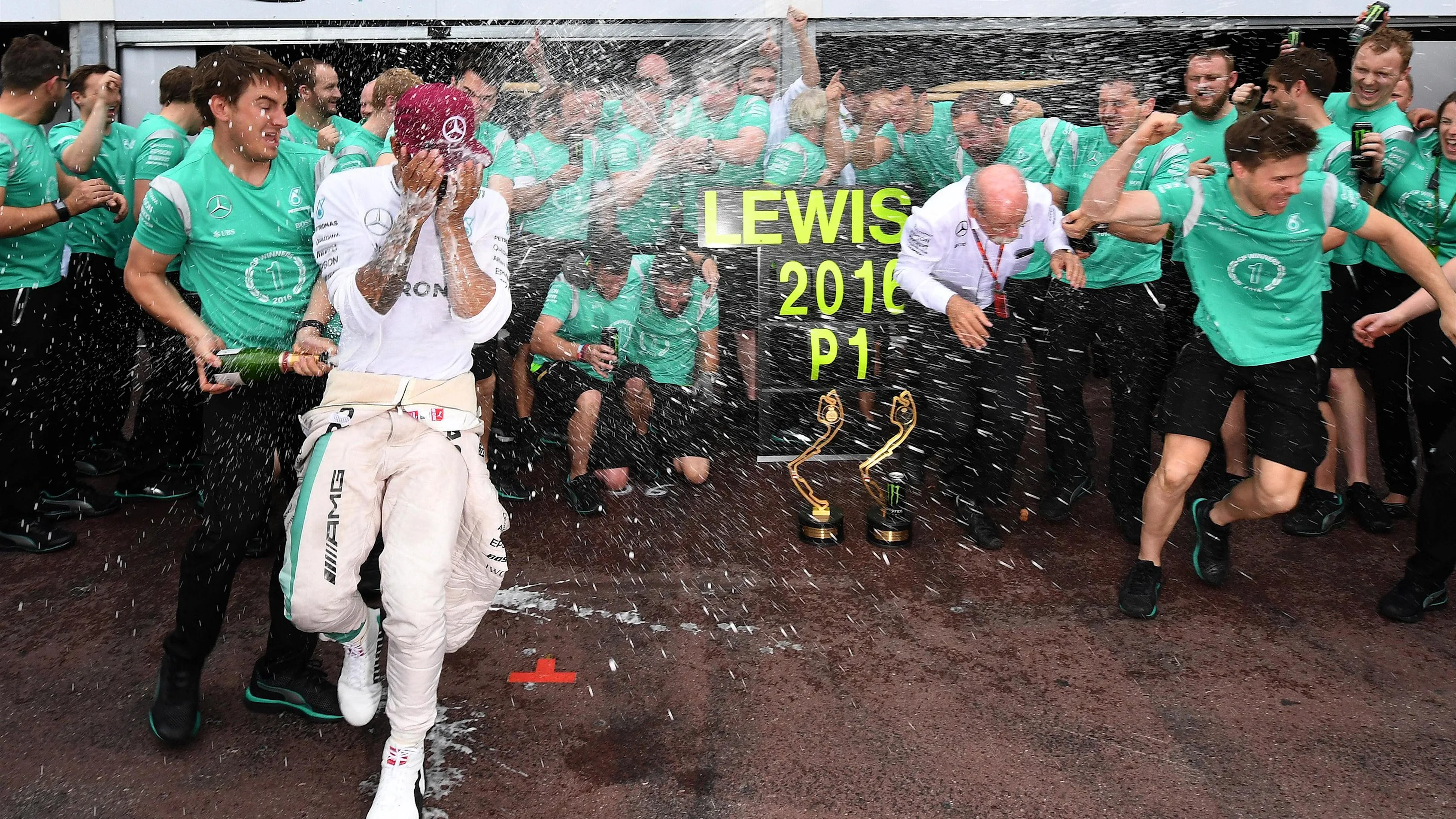 Lewis Hamilton (GBR) Mercedes AMG F1 celebrates with the team and the champagne at Formula One