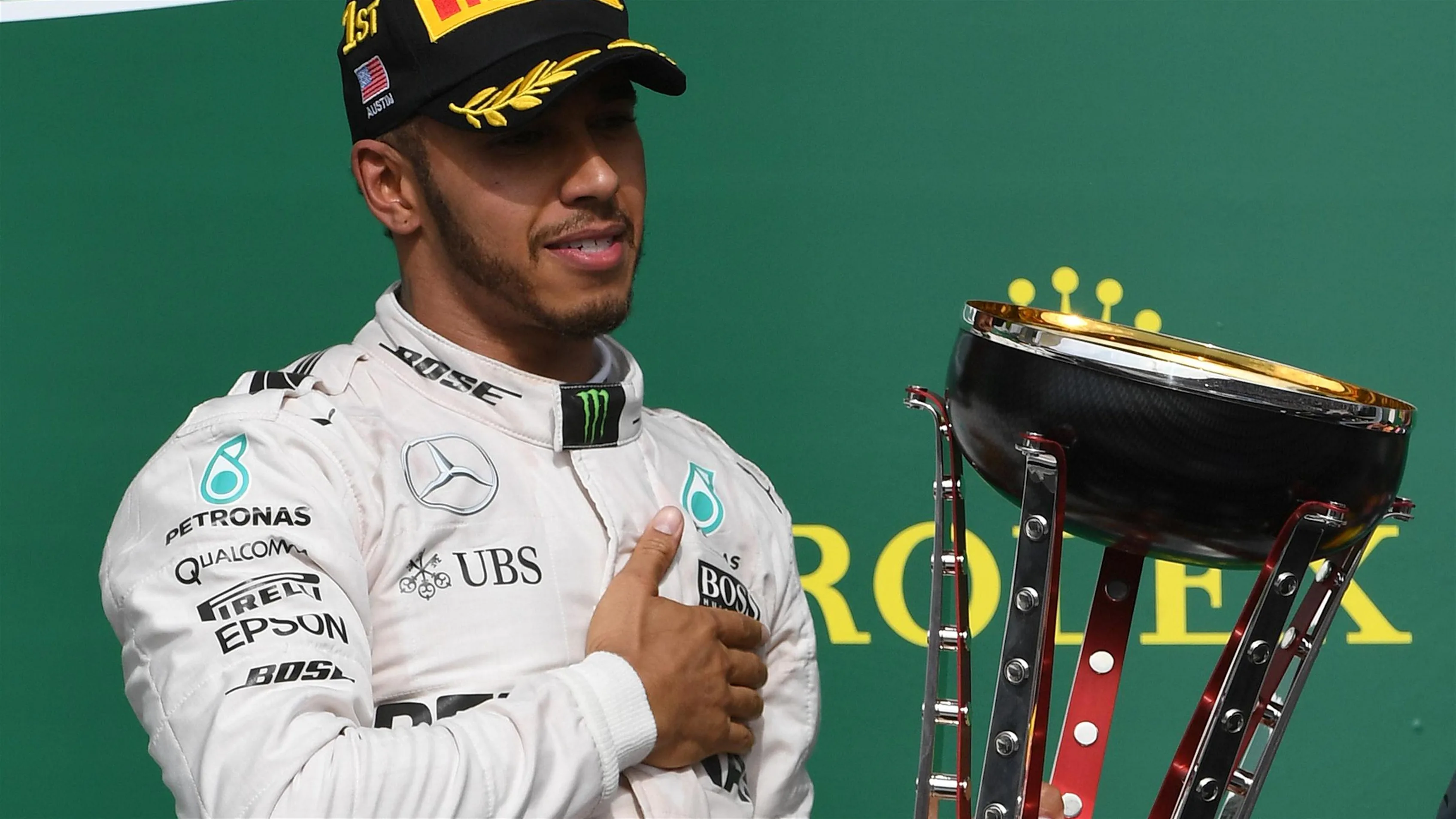 Race winner Lewis Hamilton (GBR) Mercedes AMG F1 on the podium with the trophy at Formula One World