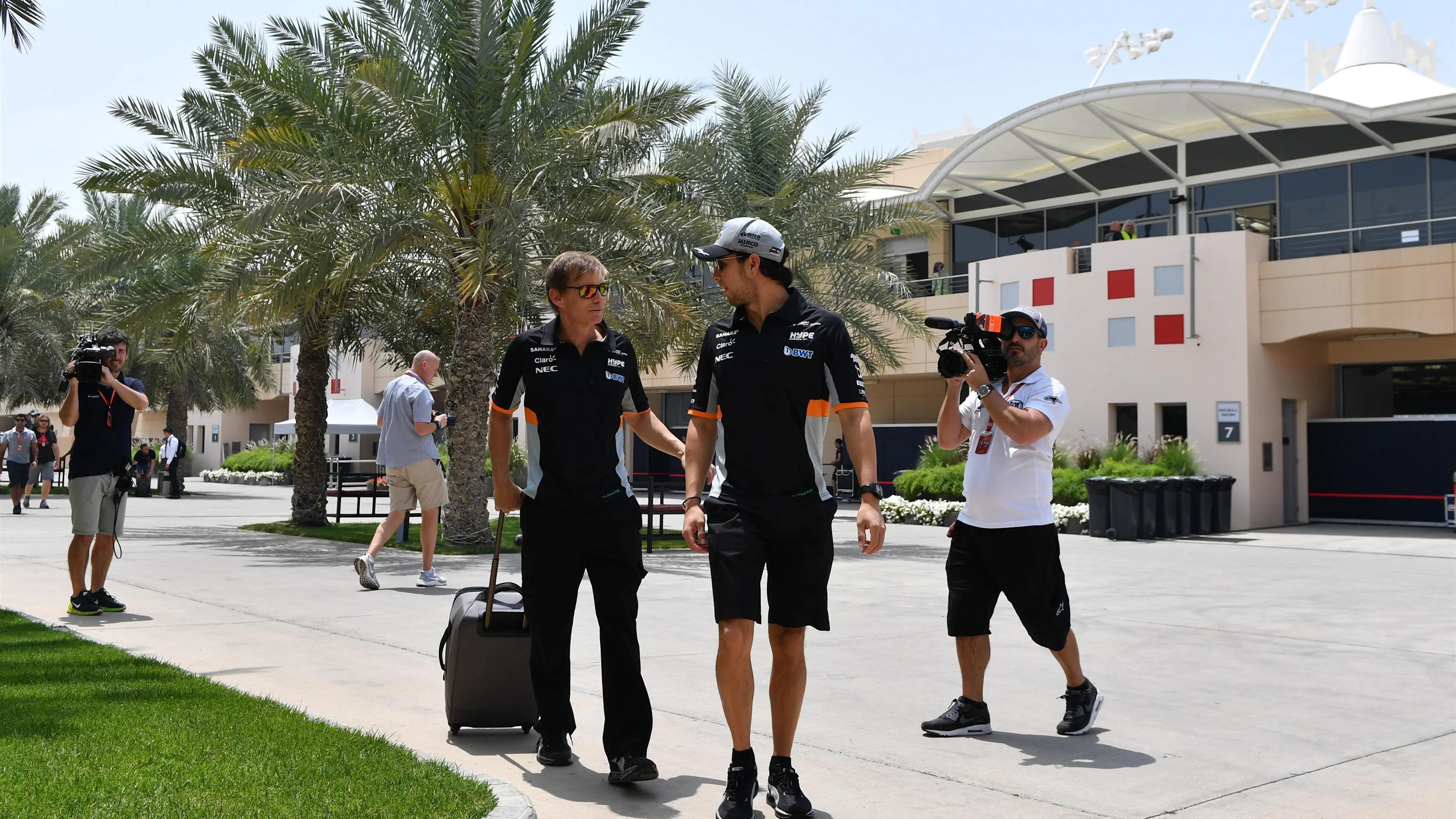 Sergio Perez (MEX) Force India and Xavi Martos (ESP) Trainer at Formula One World Championship, Rd3, Bahrain Grand Prix Preparations, Bahrain International Circuit, Sakhir, Bahrain, Thursday 13 April 2017. © Sutton Motorsport Images