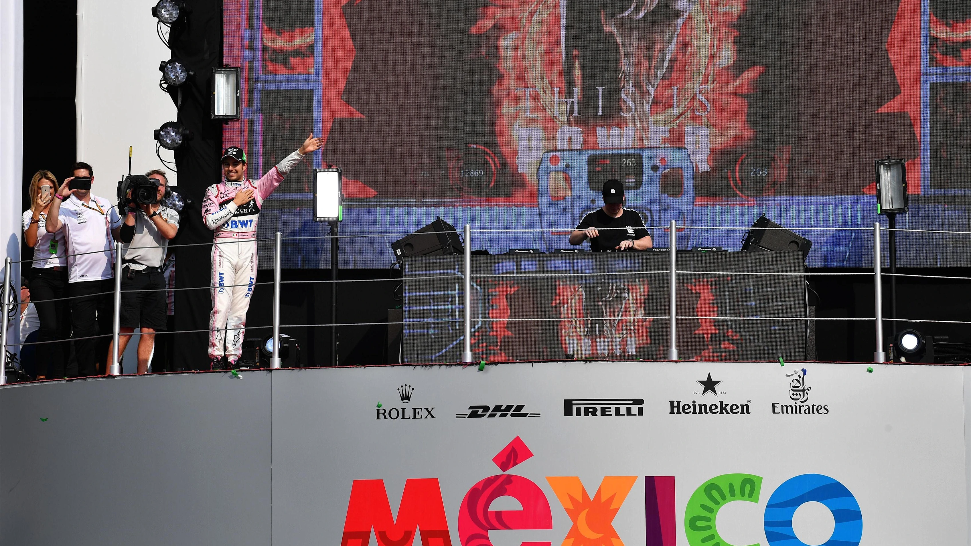 Sergio Perez (MEX) Force India on the podium post race at Formula One World Championship, Rd18,