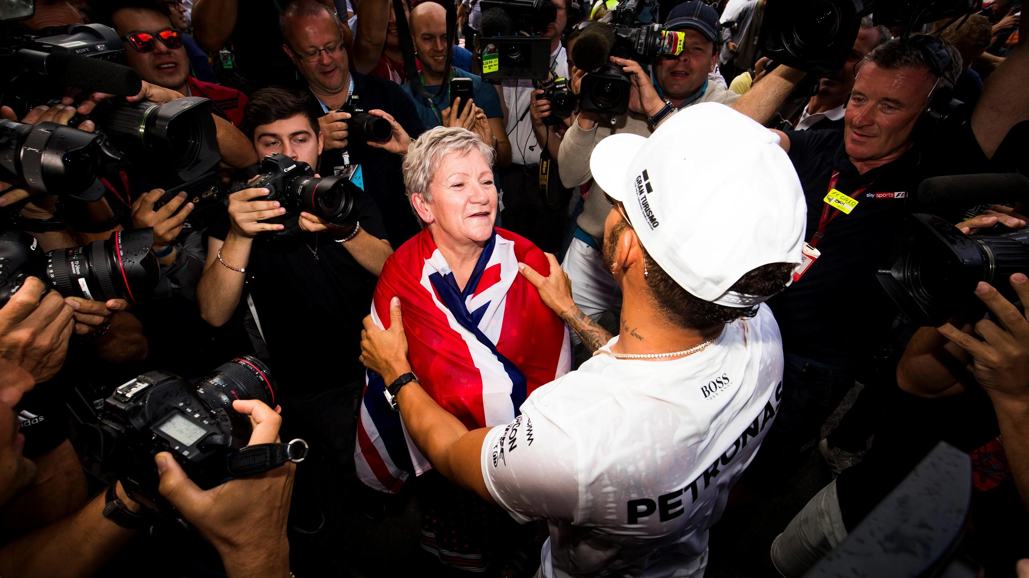 World Champion Lewis Hamilton (GBR) Mercedes AMG F1 celebrates with his Mother Carmen Lockhart
