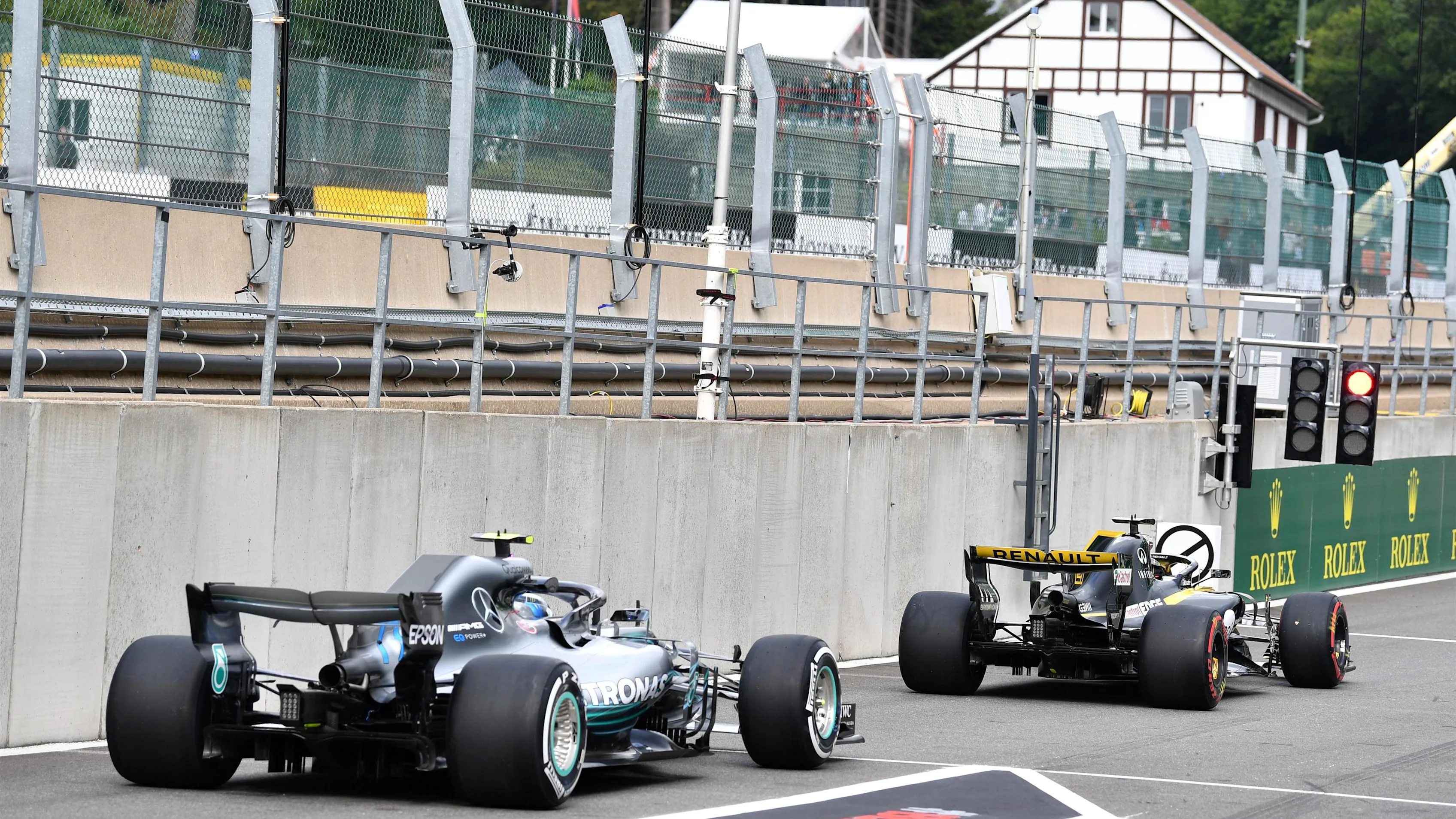 Nico Hulkenberg, Renault Sport F1 Team R.S. 18 and Valtteri Bottas, Mercedes AMG F1 W09 at Formula