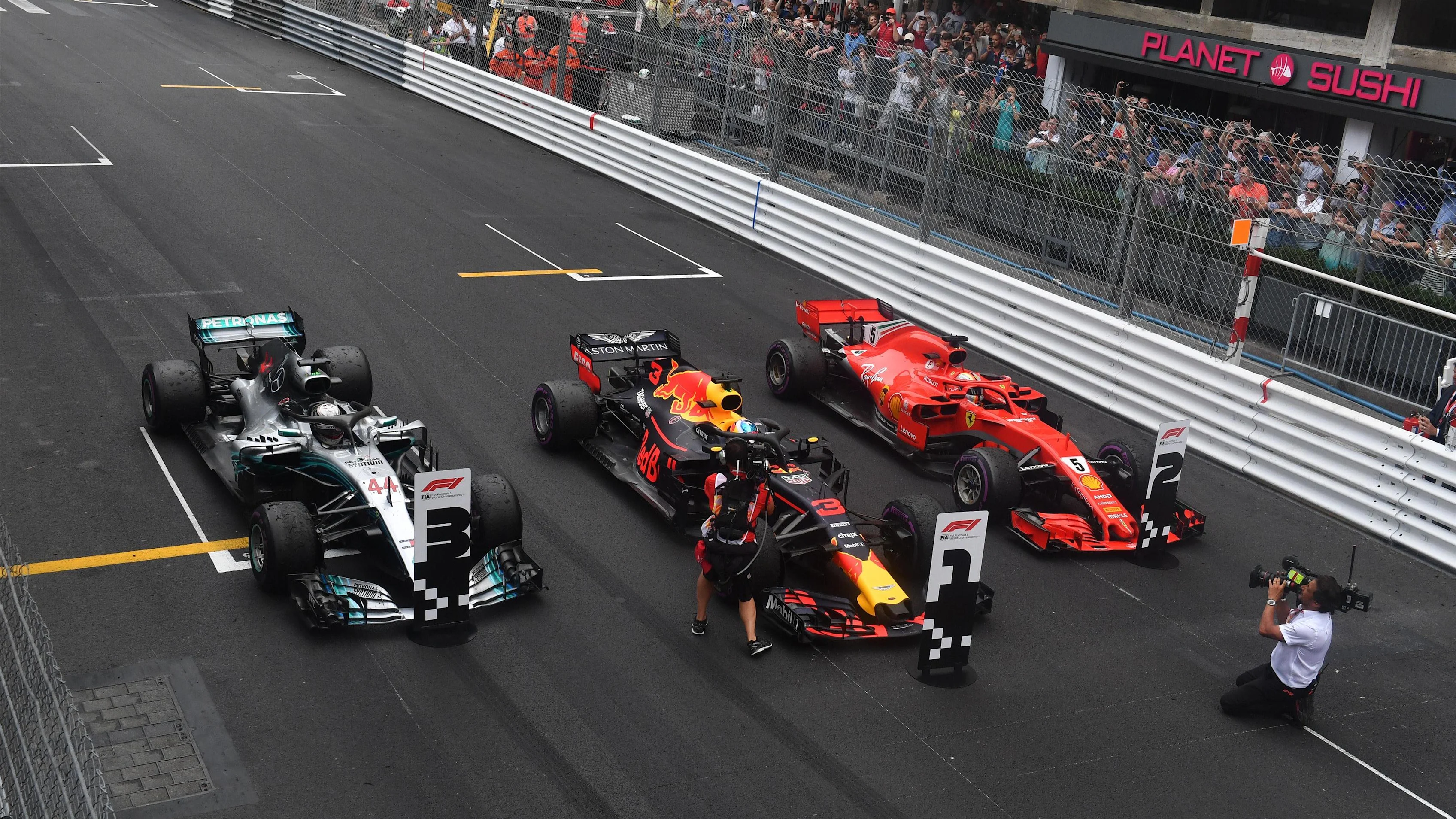Race winner Daniel Ricciardo (AUS) Red Bull Racing RB14 celebrates in parc ferme alongside Lewis