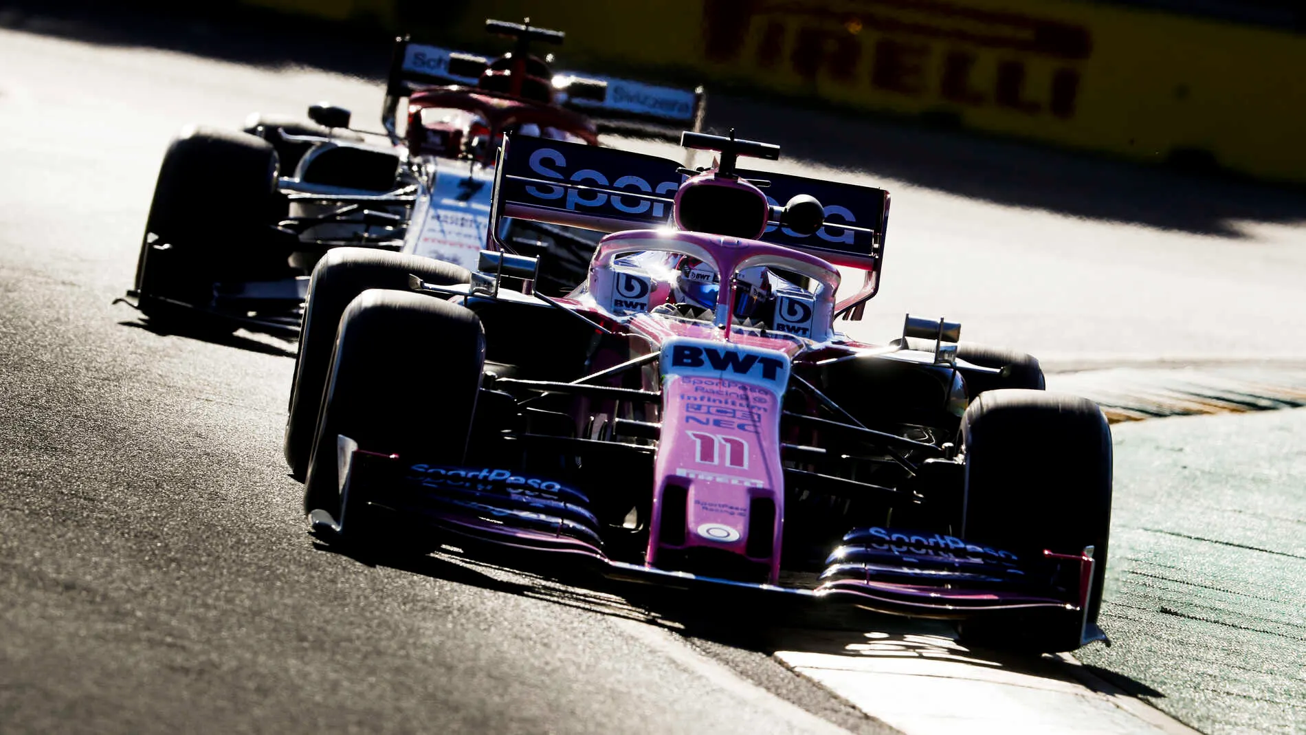 MELBOURNE GRAND PRIX CIRCUIT, AUSTRALIA - MARCH 15: Sergio Perez, Racing Point RP19, leads Kimi Raikkonen, Alfa Romeo Racing C38 during the Australian GP at Melbourne Grand Prix Circuit on March 15, 2019 in Melbourne Grand Prix Circuit, Australia. (Photo by Steven Tee / LAT Images)