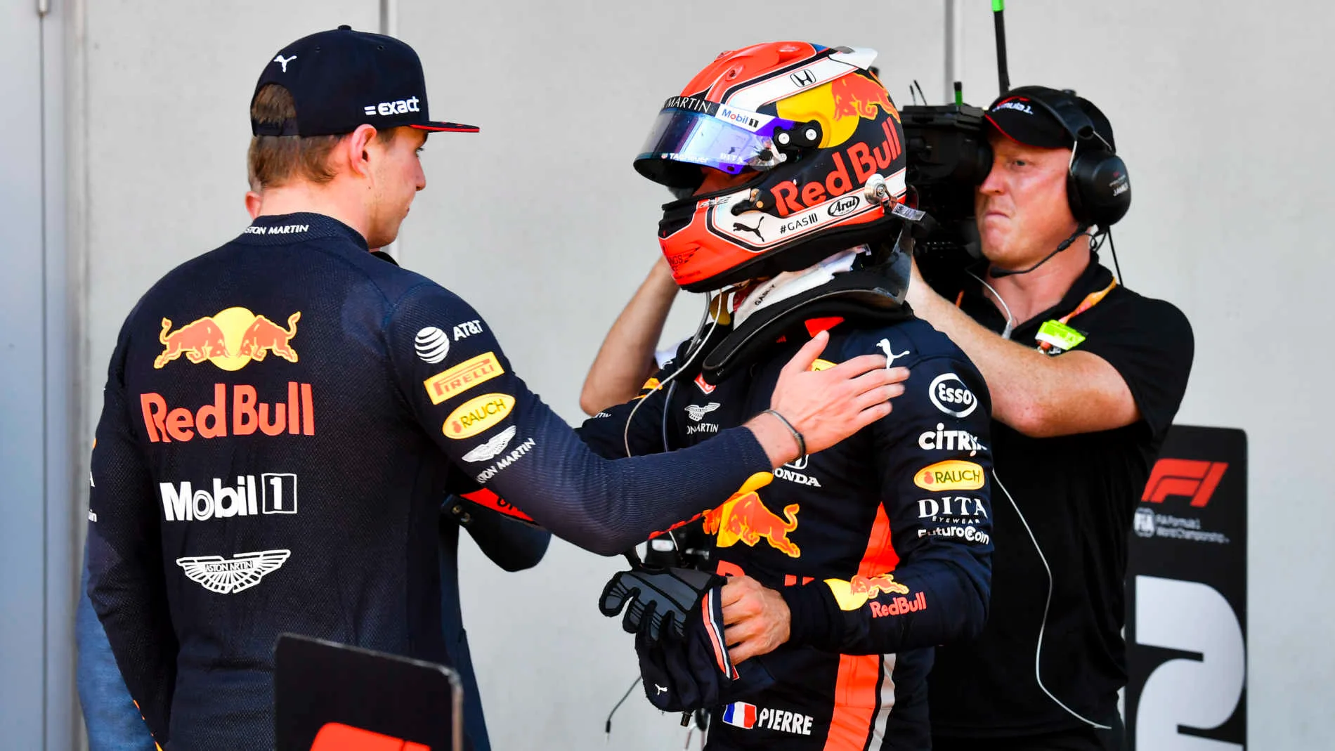 RED BULL RING, AUSTRIA - JUNE 30: Pierre Gasly, Red Bull Racing, congratulates team mate Max