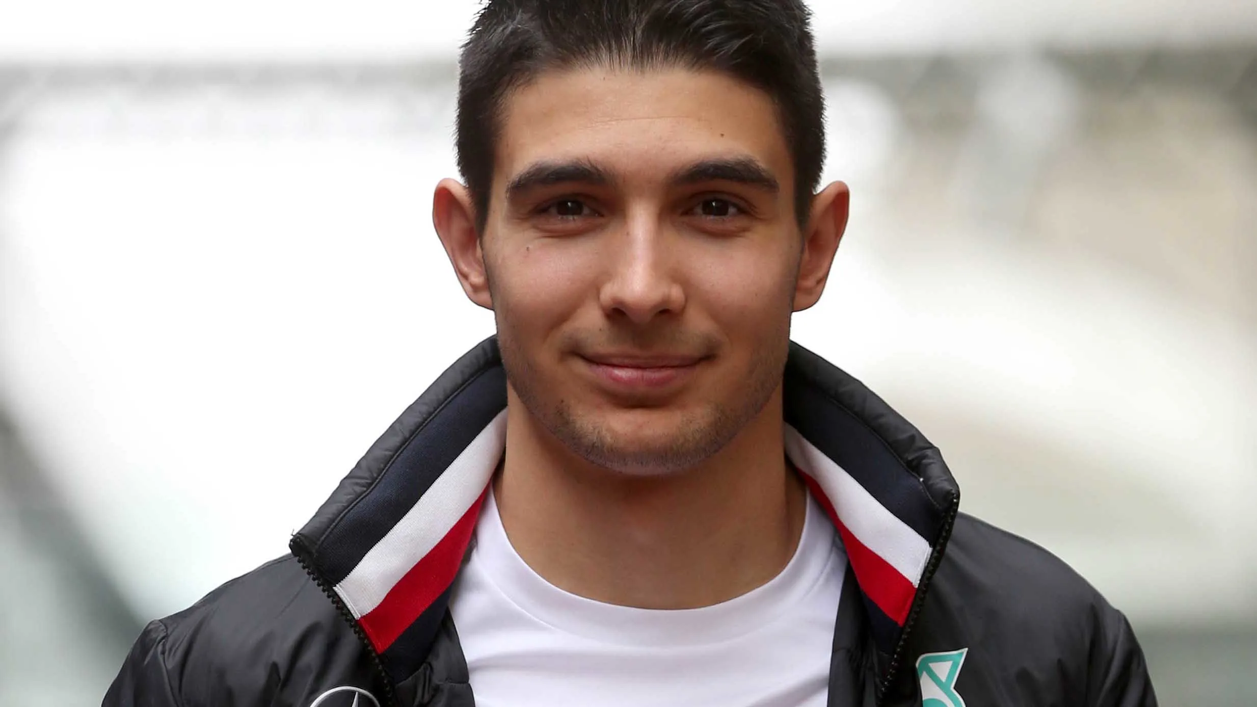 SAO PAULO, BRAZIL - NOVEMBER 15: Esteban Ocon of France and Mercedes GP walks in the Paddock before