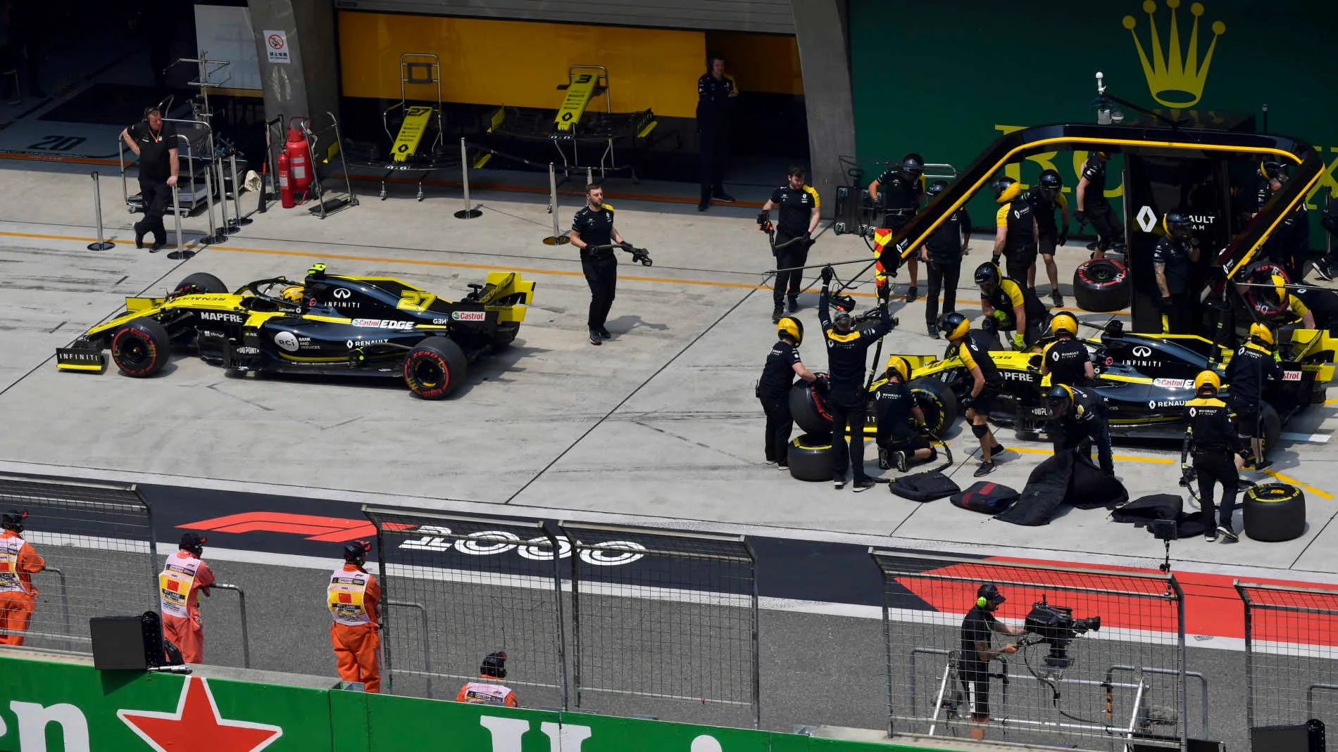 SHANGHAI INTERNATIONAL CIRCUIT, CHINA - APRIL 12: Nico Hulkenberg, Renault R.S. 19, and Daniel Ricciardo, Renault R.S.19, in the pit lane during the Chinese GP at Shanghai International Circuit on April 12, 2019 in Shanghai International Circuit, China. (Photo by Jerry Andre / Sutton Images)