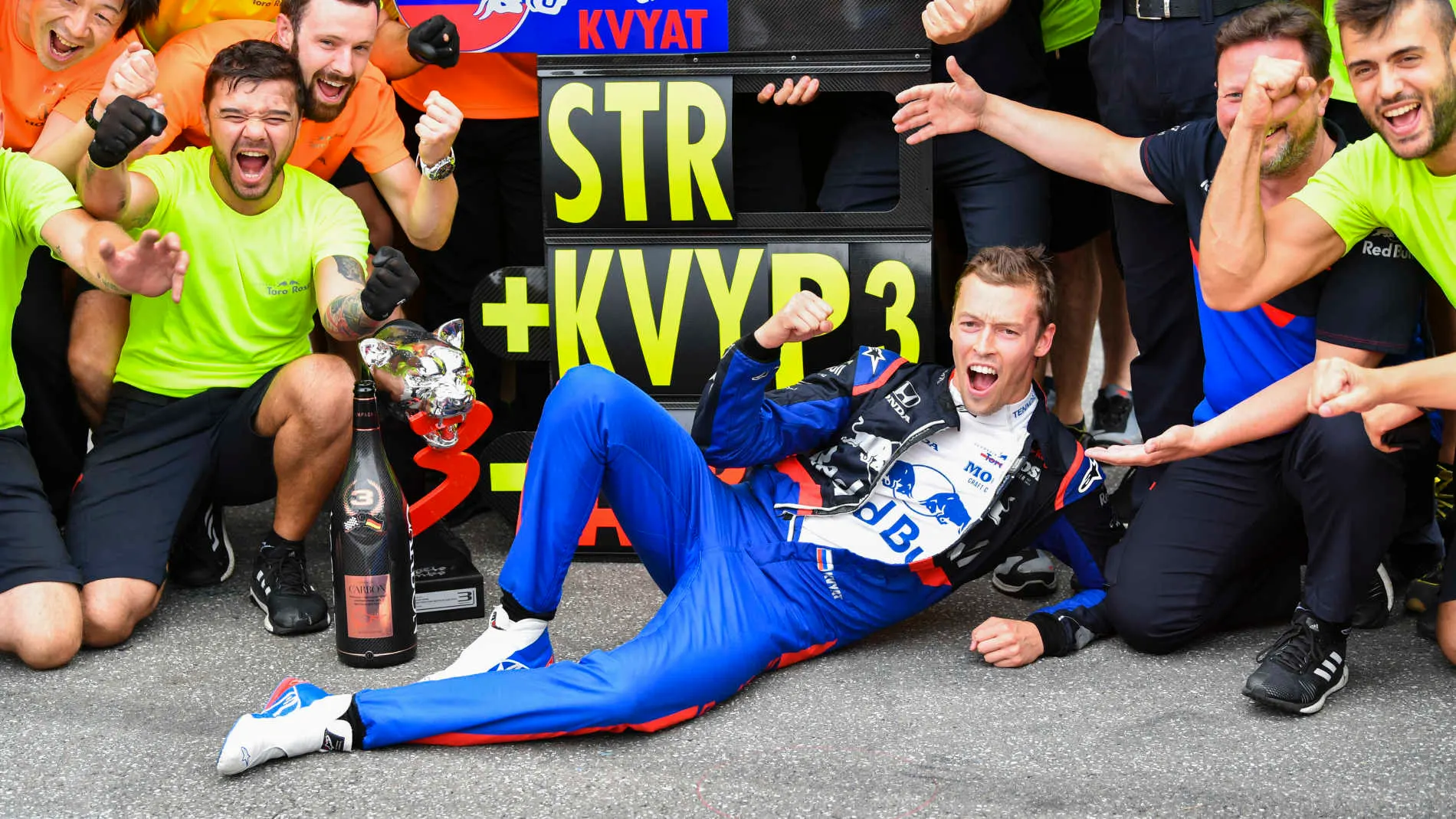 HOCKENHEIMRING, GERMANY - JULY 28: Daniil Kvyat, Toro Rosso, 3rd position, celebrates with his team
