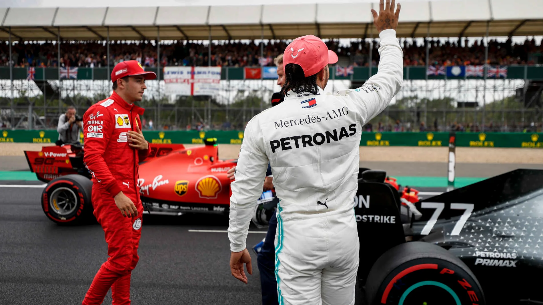 SILVERSTONE, UNITED KINGDOM - JULY 13: Charles Leclerc, Ferrari, and Lewis Hamilton, Mercedes AMG F1, on the grid after Qualifying during the British GP at Silverstone on July 13, 2019 in Silverstone, United Kingdom. (Photo by Glenn Dunbar / LAT Images)