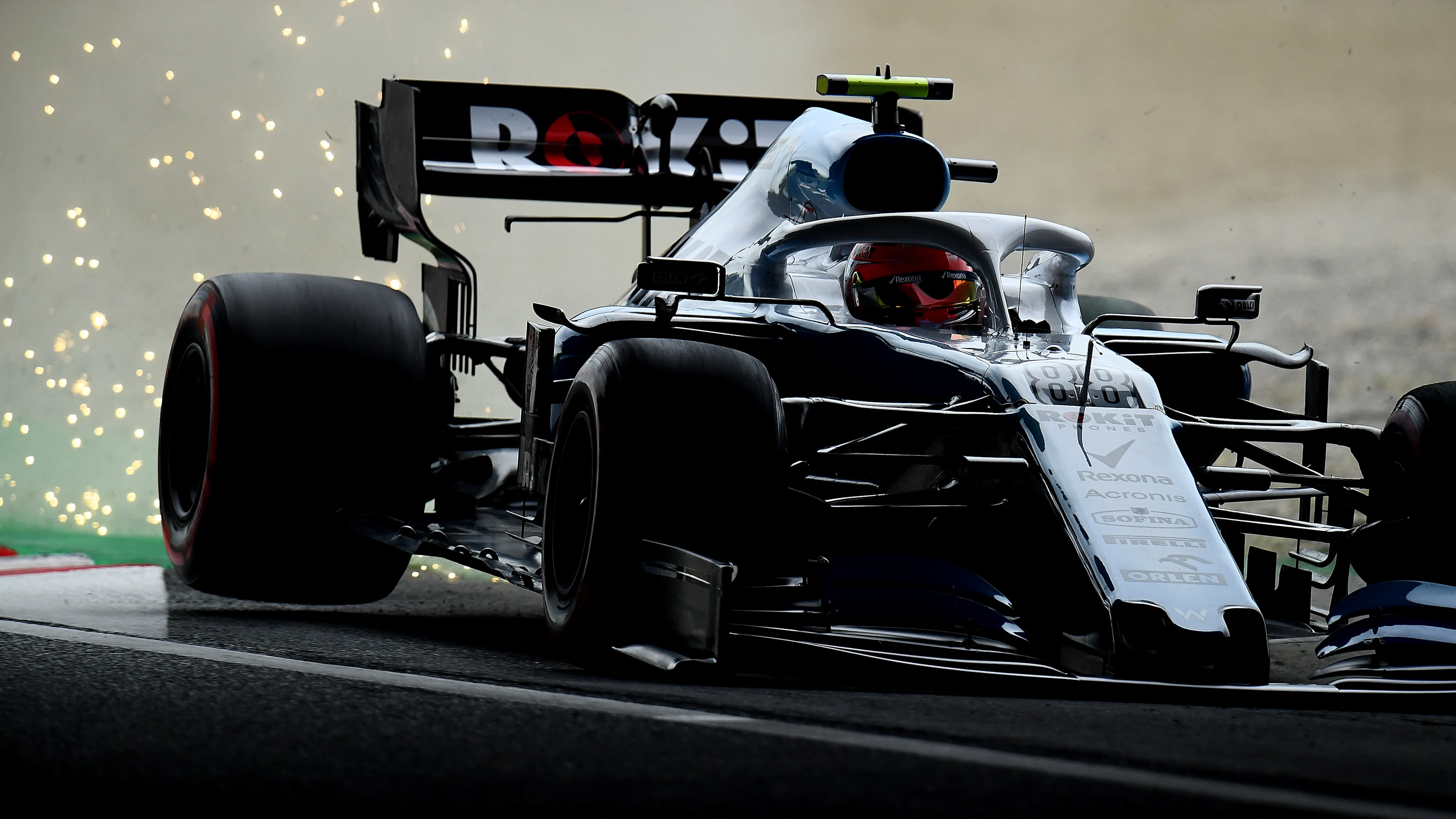SUZUKA, JAPAN - OCTOBER 11: Sparks fly behind Robert Kubica of Poland driving the (88) Rokit Williams Racing FW42 Mercedes on track during practice for the F1 Grand Prix of Japan at Suzuka Circuit on October 11, 2019 in Suzuka, Japan. (Photo by Clive Mason/Getty Images)