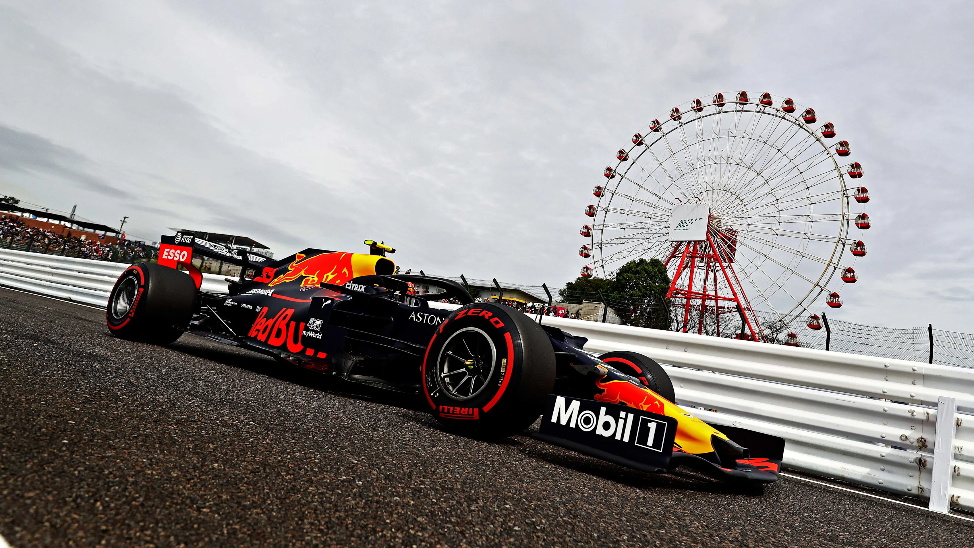 SUZUKA, JAPAN - OCTOBER 11: Alexander Albon of Thailand driving the (23) Aston Martin Red Bull
