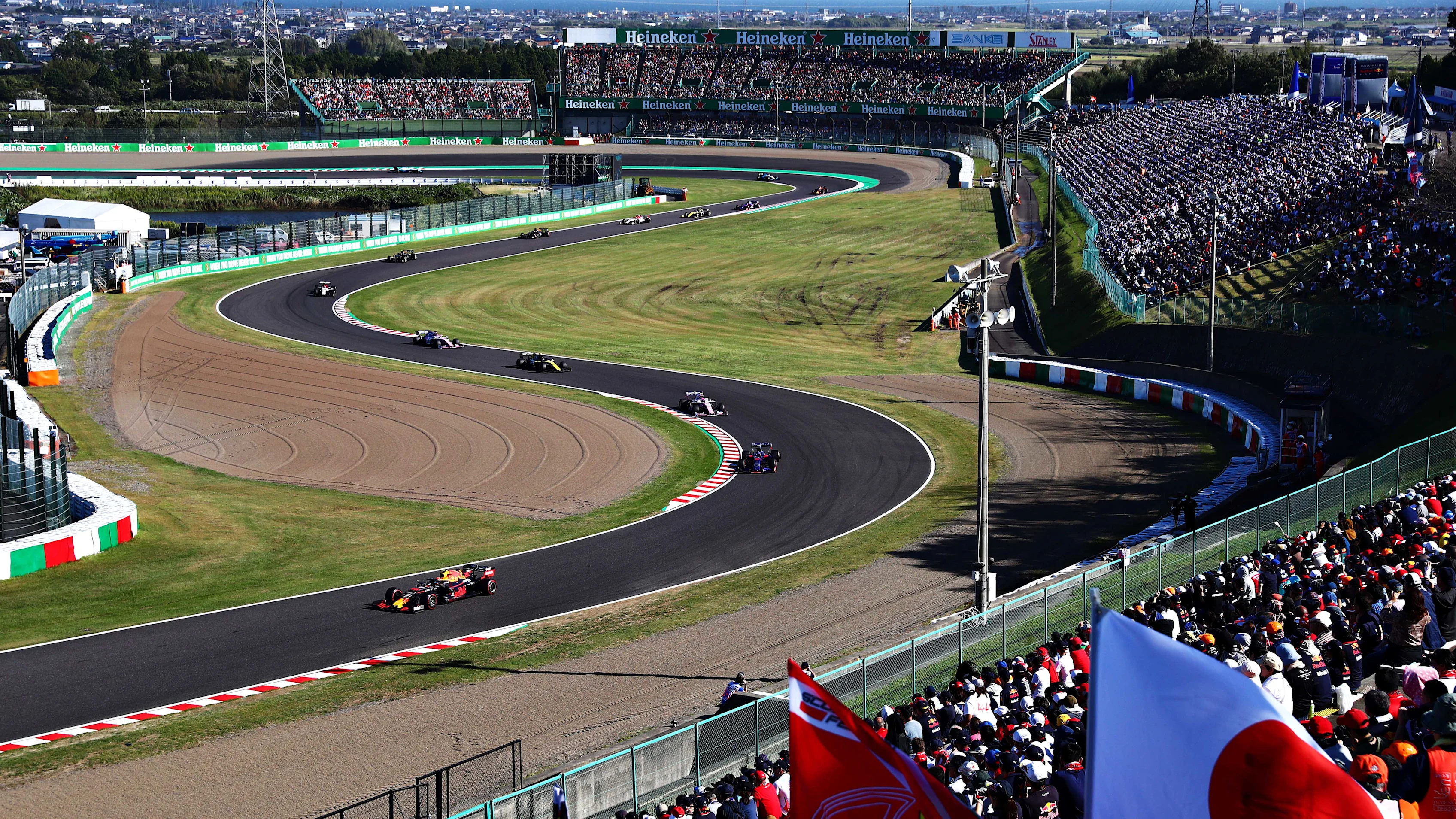 SUZUKA, JAPAN - OCTOBER 13: Alexander Albon of Thailand driving the (23) Aston Martin Red Bull