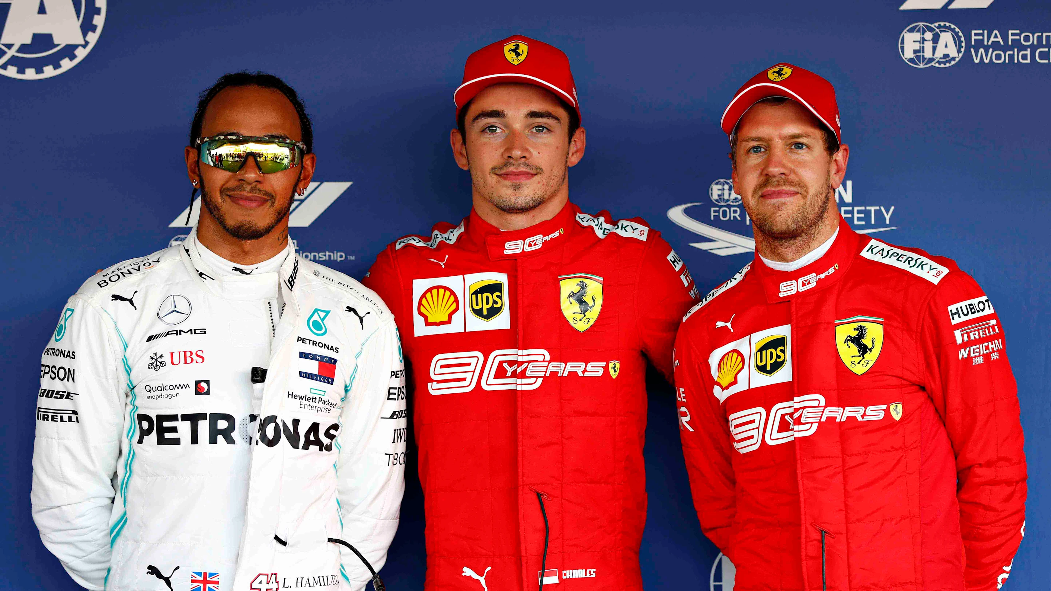 SOCHI, RUSSIA - SEPTEMBER 28: Top three qualifiers Charles Leclerc of Monaco and Ferrari,Lewis