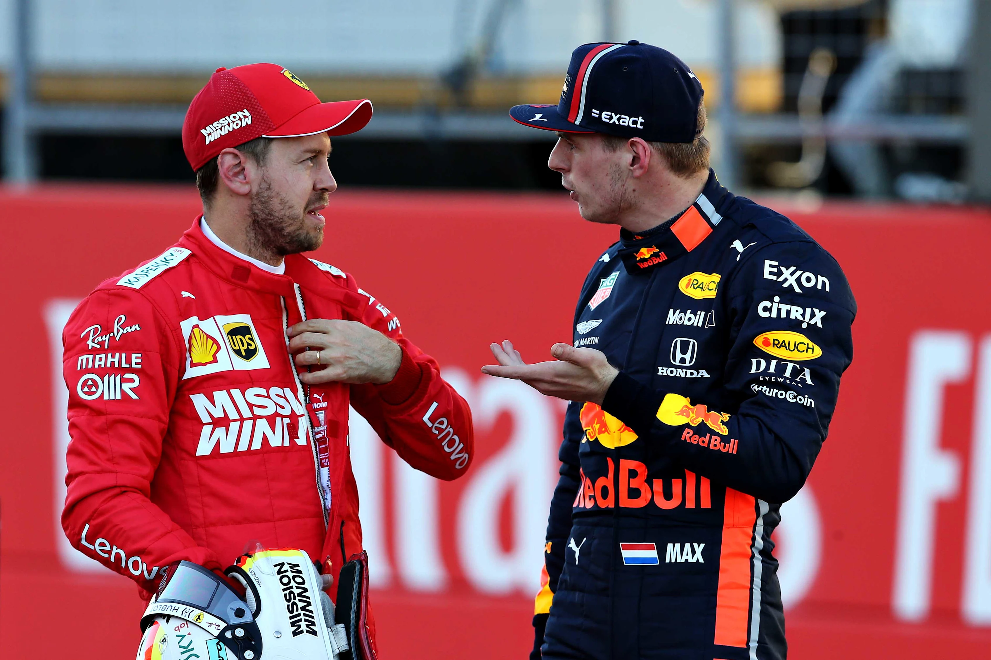 AUSTIN, TEXAS - NOVEMBER 02: Second place qualifier Sebastian Vettel of Germany and Ferrari talks