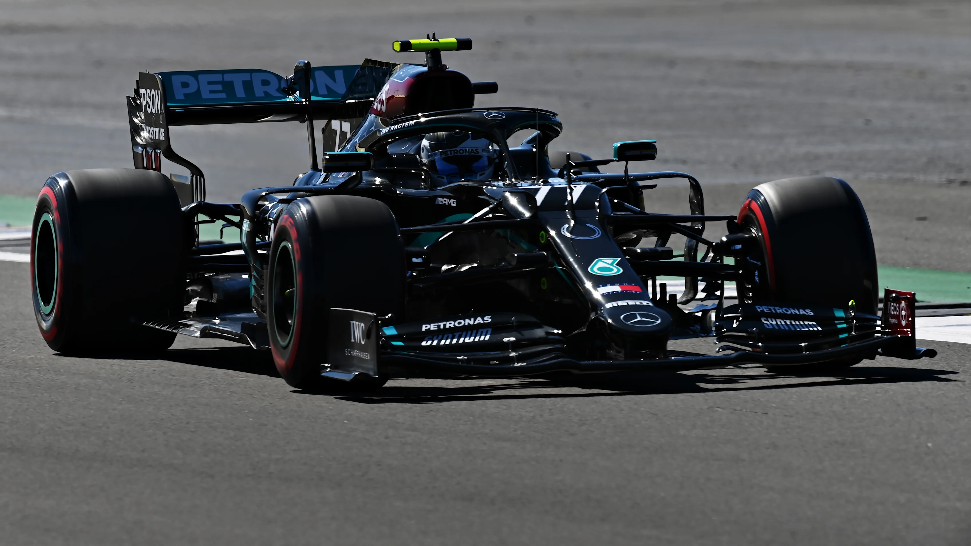 NORTHAMPTON, ENGLAND - AUGUST 07: Valtteri Bottas of Finland driving the (77) Mercedes AMG Petronas