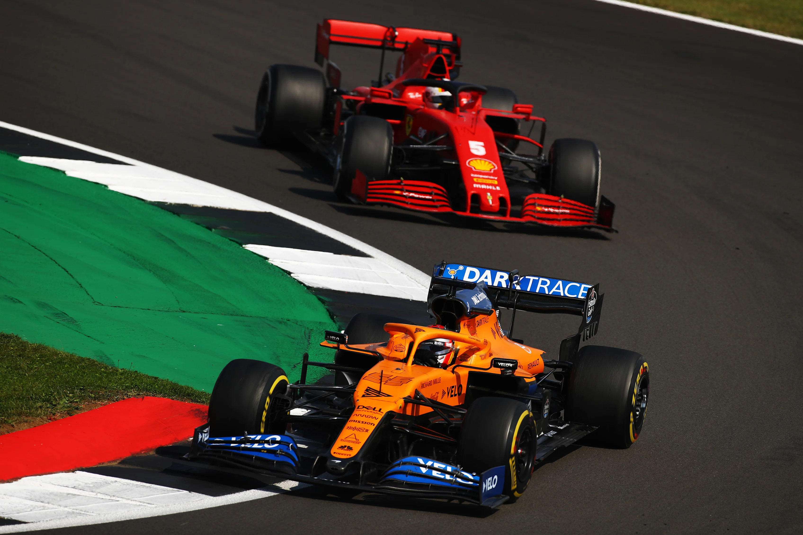 NORTHAMPTON, ENGLAND - AUGUST 09: Carlos Sainz of Spain driving the (55) McLaren F1 Team MCL35