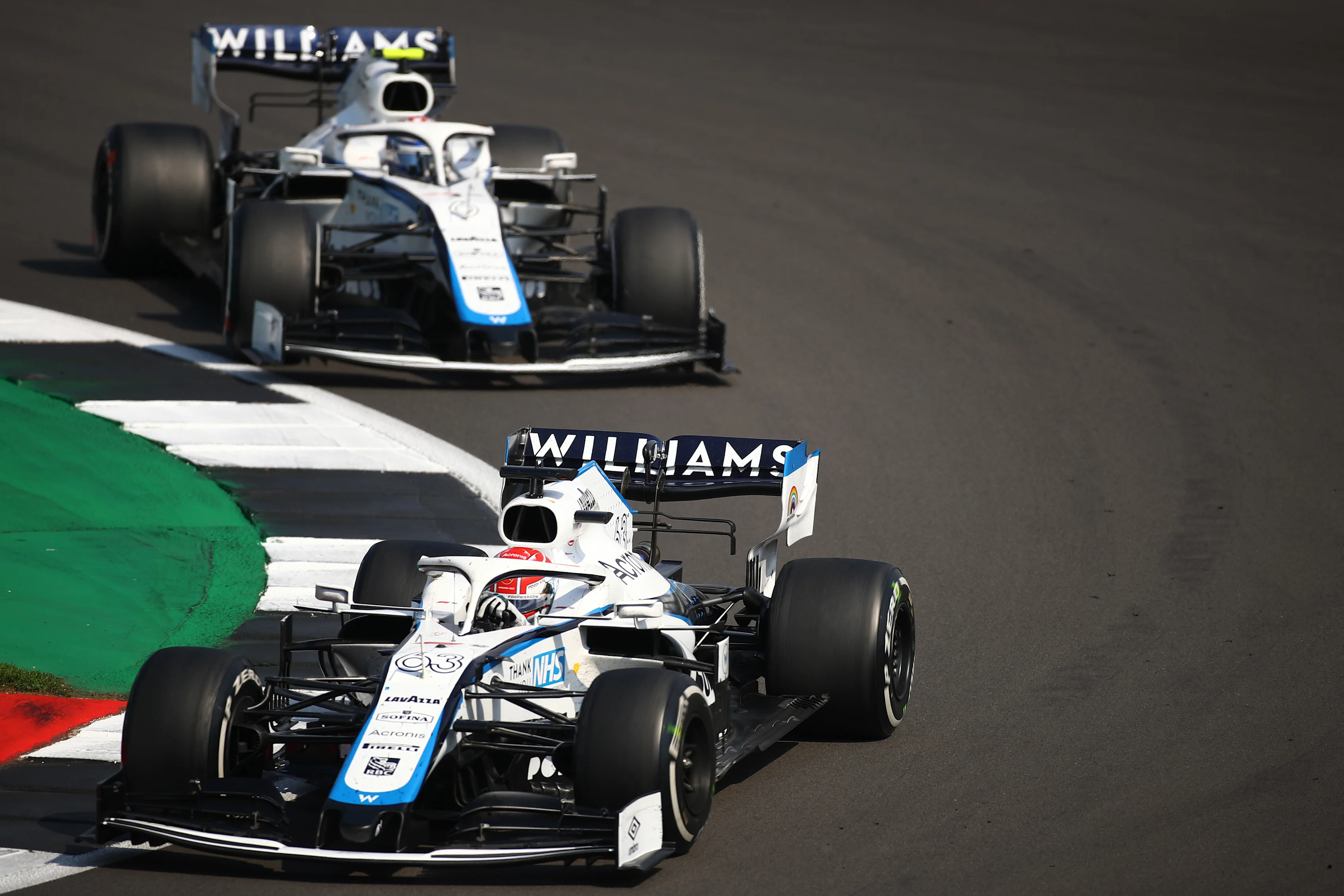 NORTHAMPTON, ENGLAND - AUGUST 09: George Russell of Great Britain driving the (63) Williams Racing
