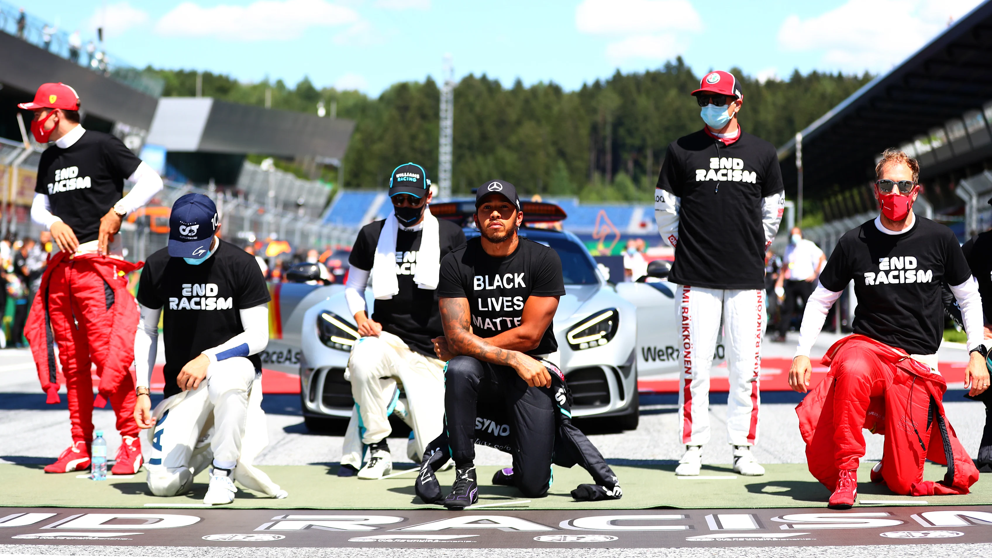 SPIELBERG, AUSTRIA - JULY 05: Lewis Hamilton of Great Britain and Mercedes GP, Pierre Gasly of