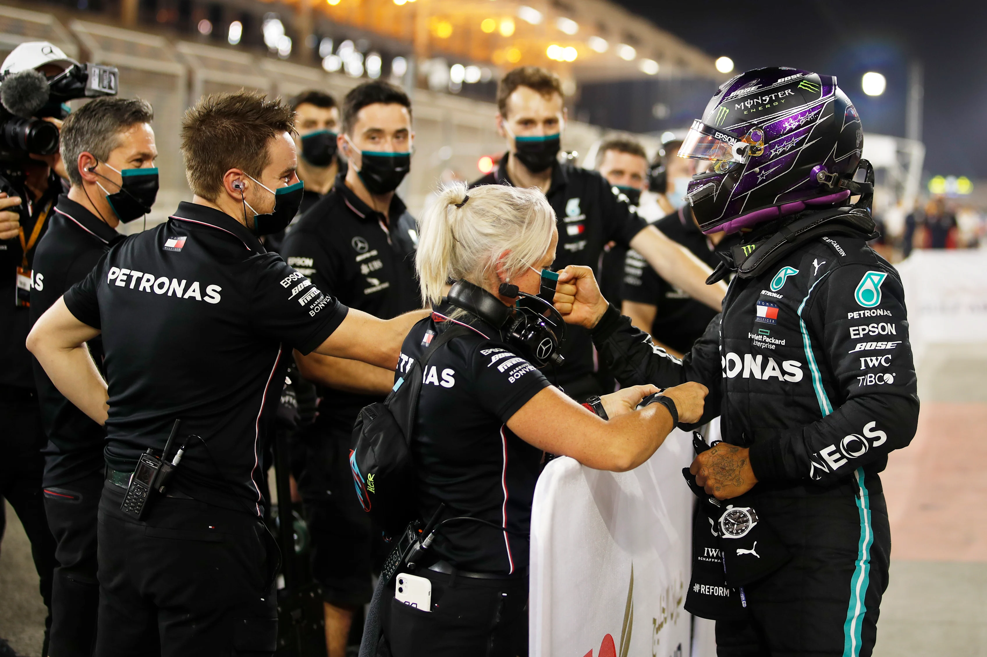 BAHRAIN, BAHRAIN - NOVEMBER 28: Pole position qualifier Lewis Hamilton of Great Britain and