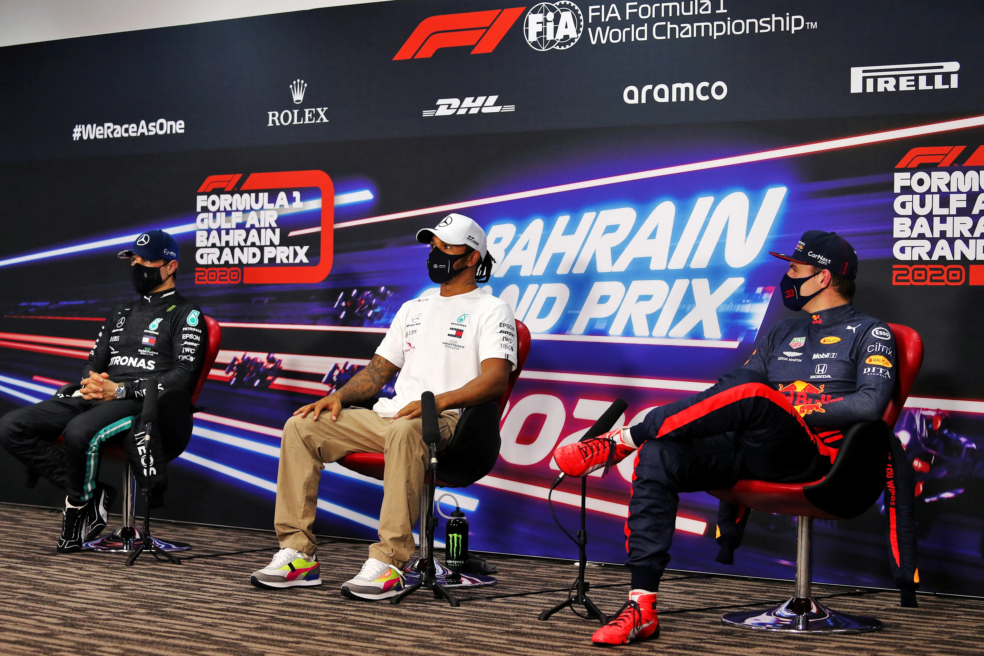 BAHRAIN, BAHRAIN - NOVEMBER 28: Pole position qualifier Lewis Hamilton of Great Britain and