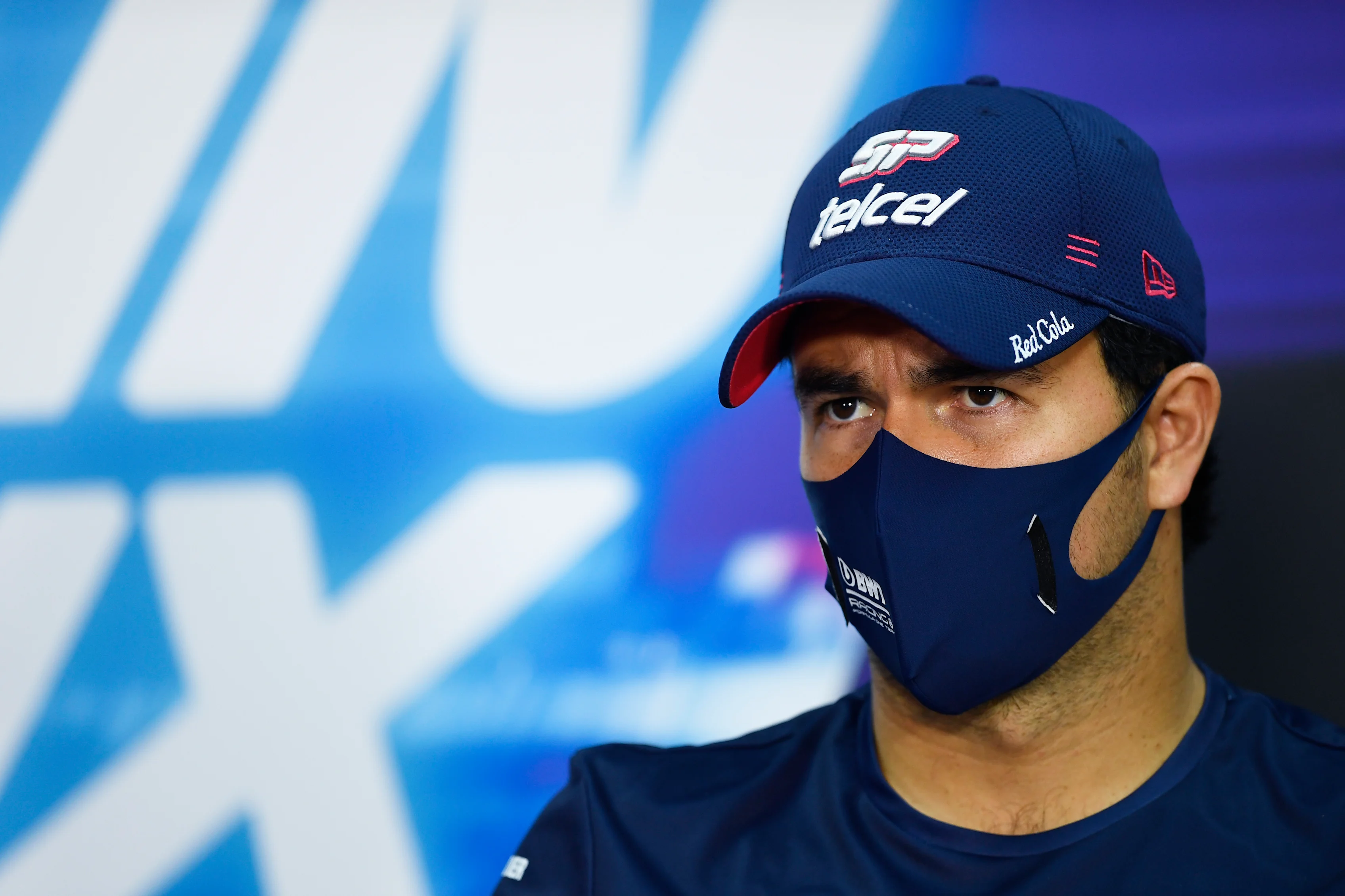 BAHRAIN, BAHRAIN - NOVEMBER 26: Sergio Perez of Mexico and Racing Point talks in the Drivers Press