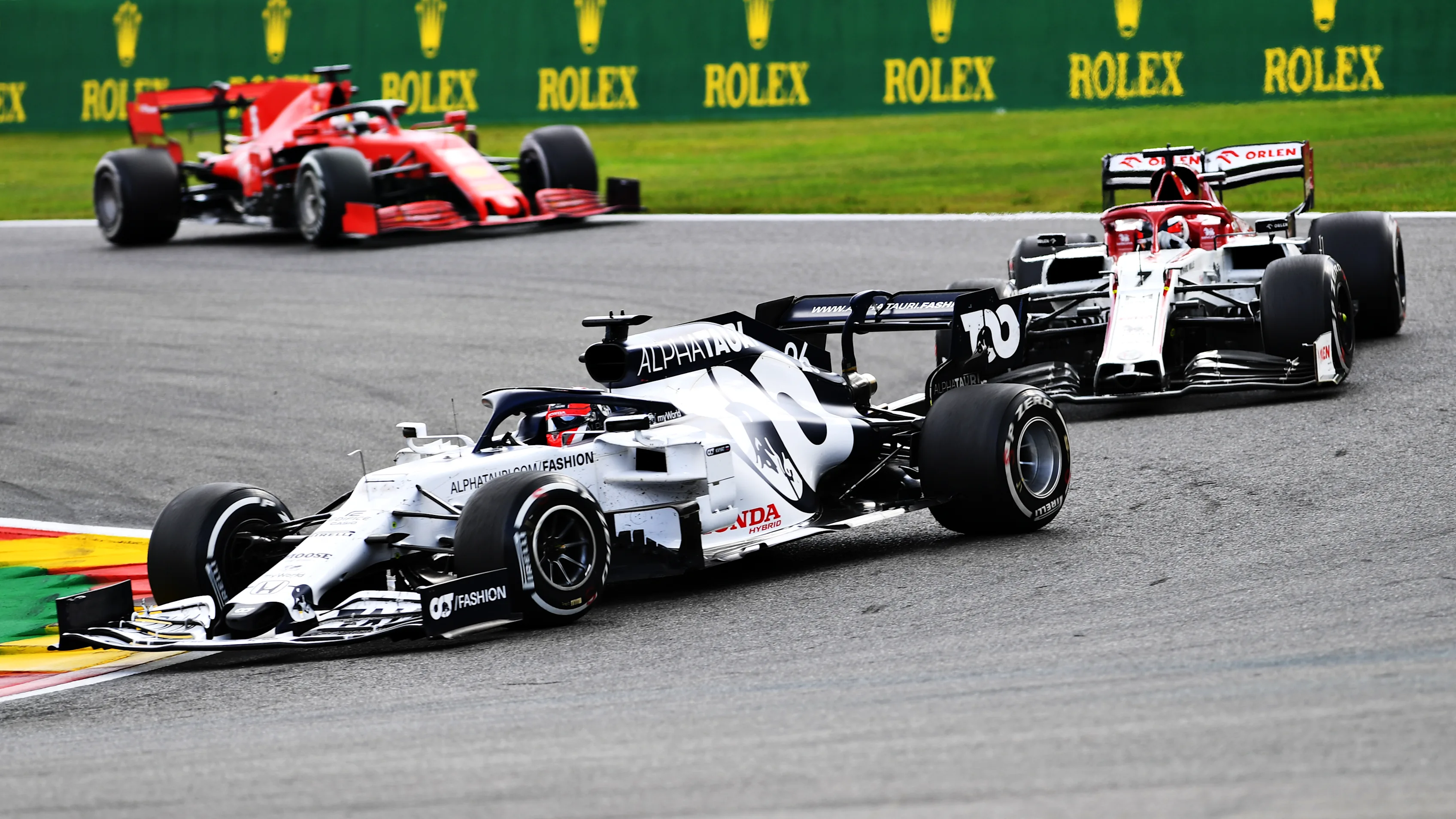 SPA, BELGIUM - AUGUST 30: Daniil Kvyat of Russia driving the (26) Scuderia AlphaTauri AT01 Honda leads Kimi Raikkonen of Finland driving the (7) Alfa Romeo Racing C39 Ferrari during the F1 Grand Prix of Belgium at Circuit de Spa-Francorchamps on August 30, 2020 in Spa, Belgium. (Photo by Clive Mason - Formula 1/Formula 1 via Getty Images)