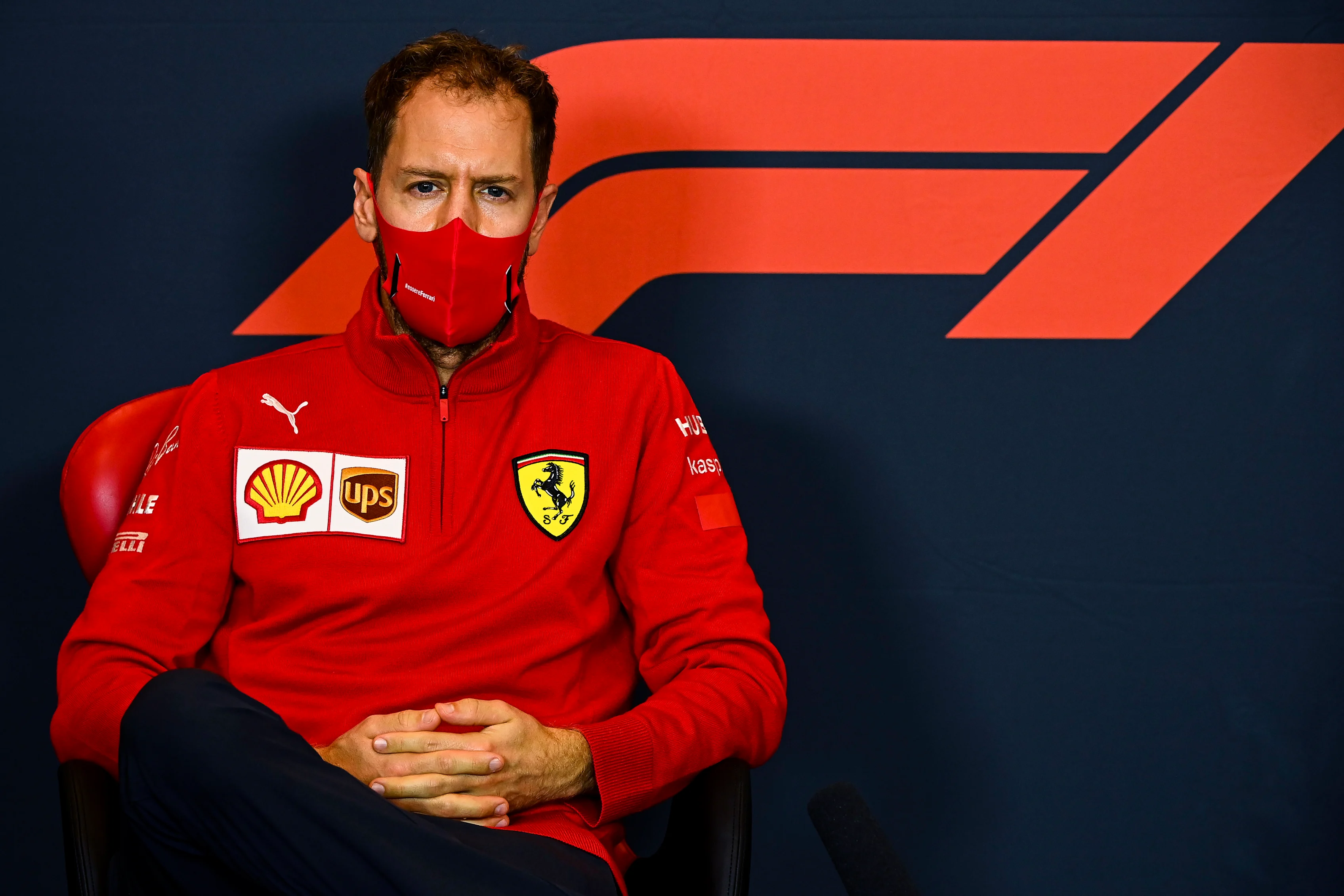 IMOLA, ITALY - OCTOBER 30: Sebastian Vettel of Germany and Ferrari talks in the Drivers Press