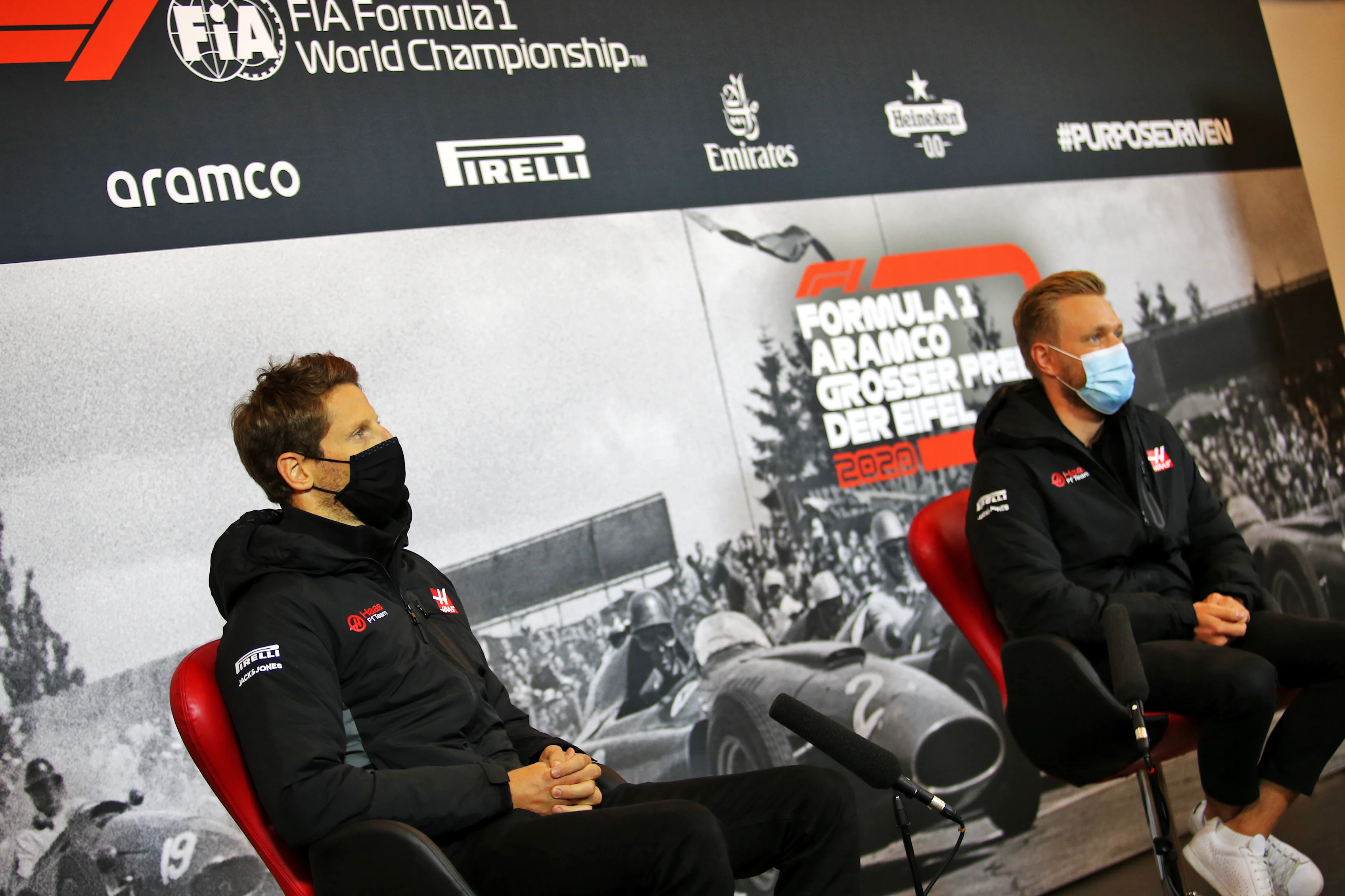 NUERBURG, GERMANY - OCTOBER 08: Romain Grosjean of France and Haas F1 and Kevin Magnussen of