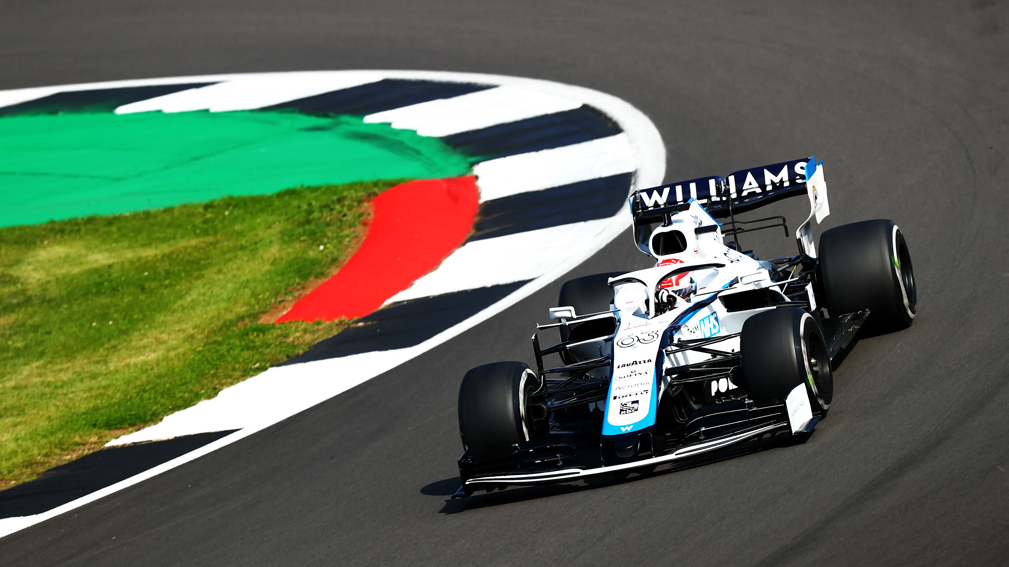 NORTHAMPTON, ENGLAND - JULY 31: George Russell of Great Britain driving the (63) Williams Racing