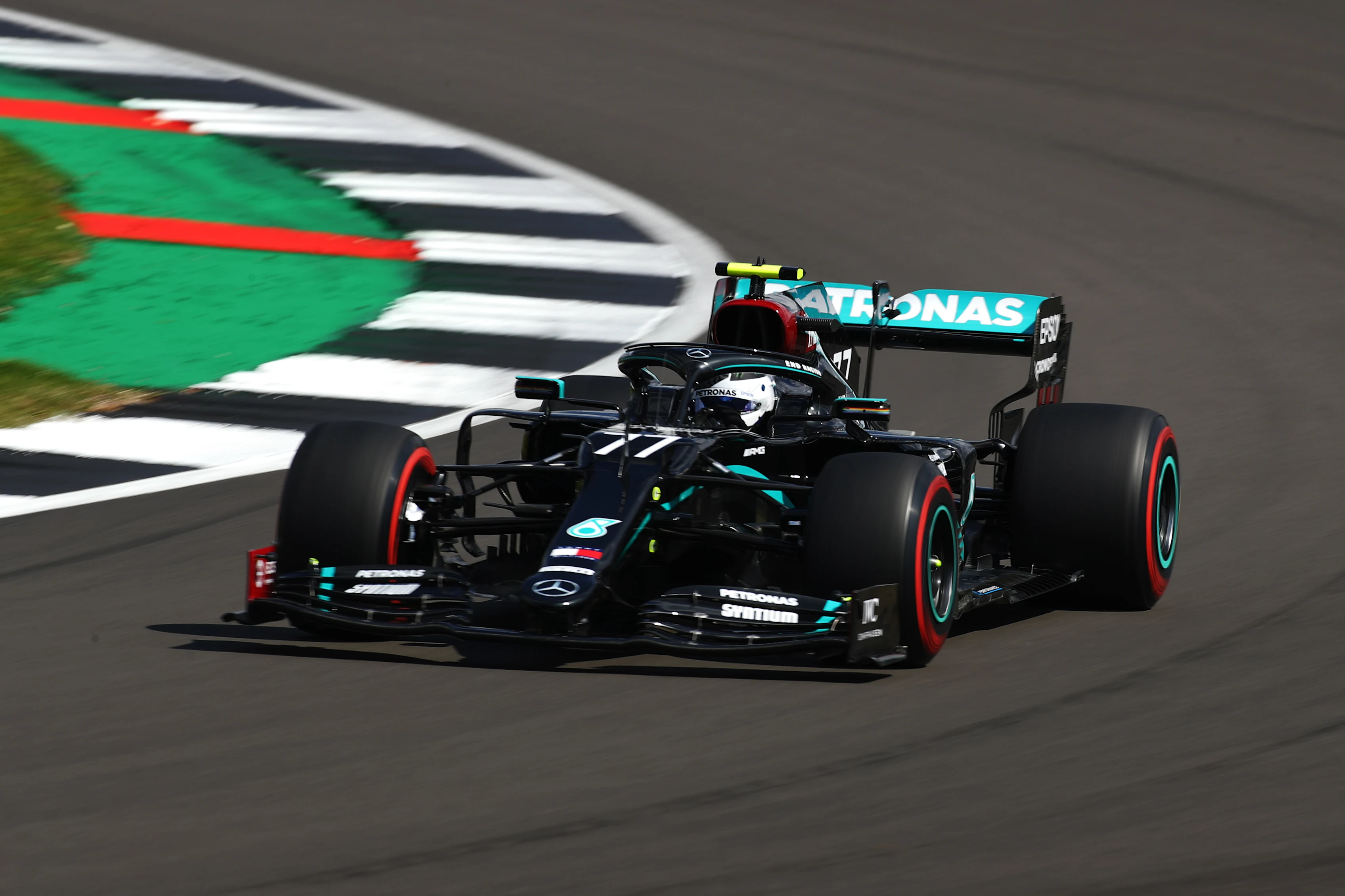 NORTHAMPTON, ENGLAND - AUGUST 01: Valtteri Bottas of Finland driving the (77) Mercedes AMG Petronas