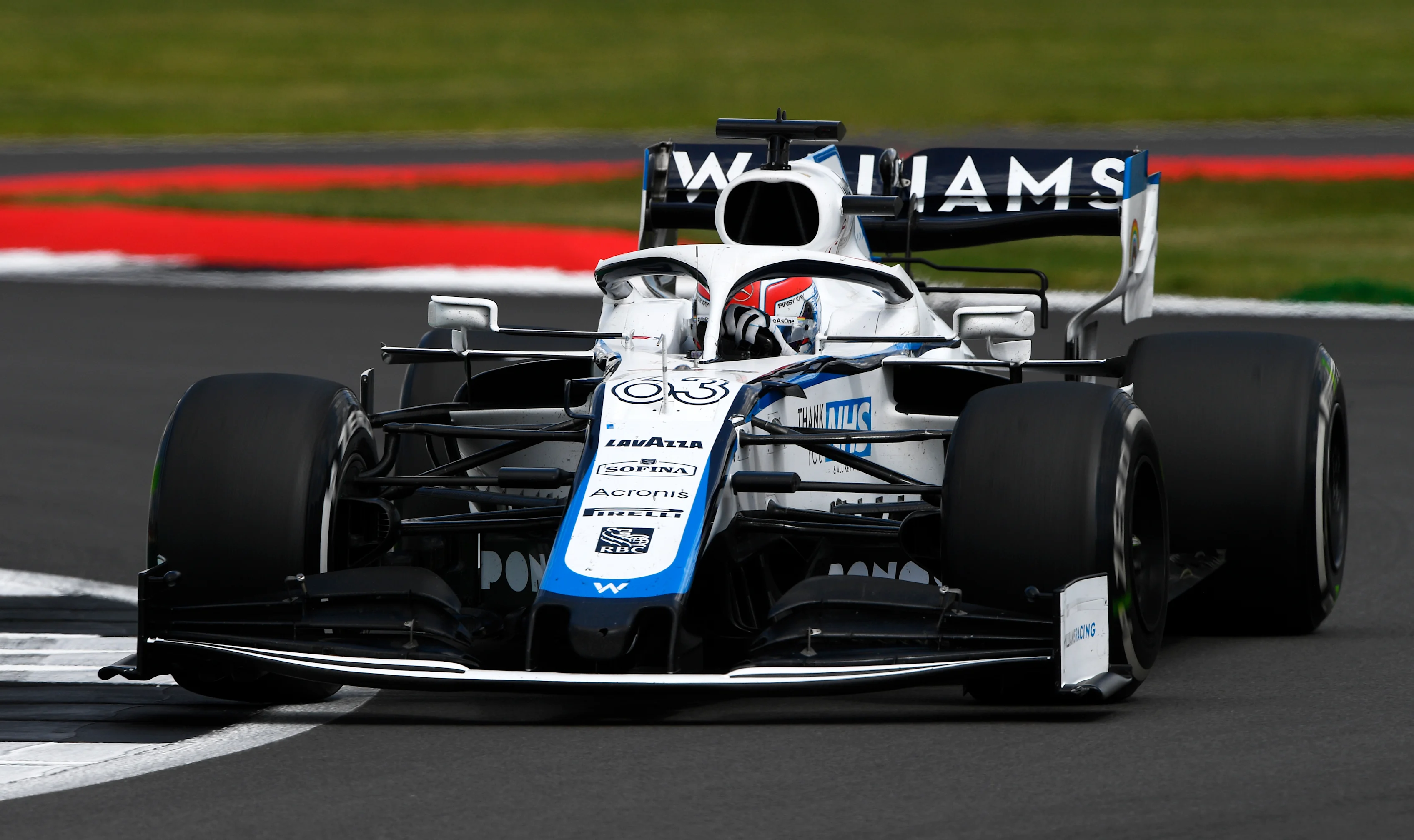 NORTHAMPTON, ENGLAND - AUGUST 02: George Russell of Great Britain driving the (63) Williams Racing