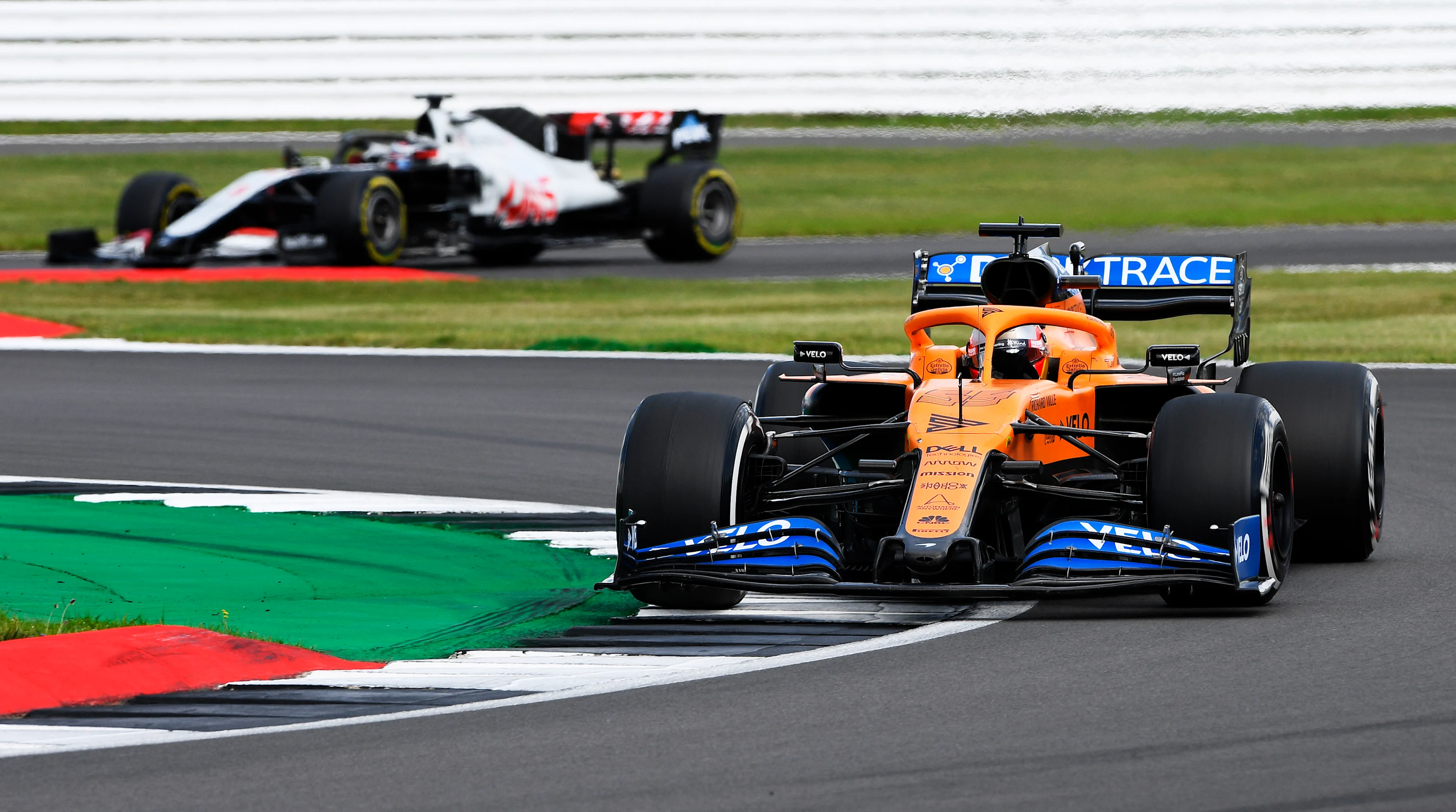 NORTHAMPTON, ENGLAND - AUGUST 02: Carlos Sainz of Spain driving the (55) McLaren F1 Team MCL35