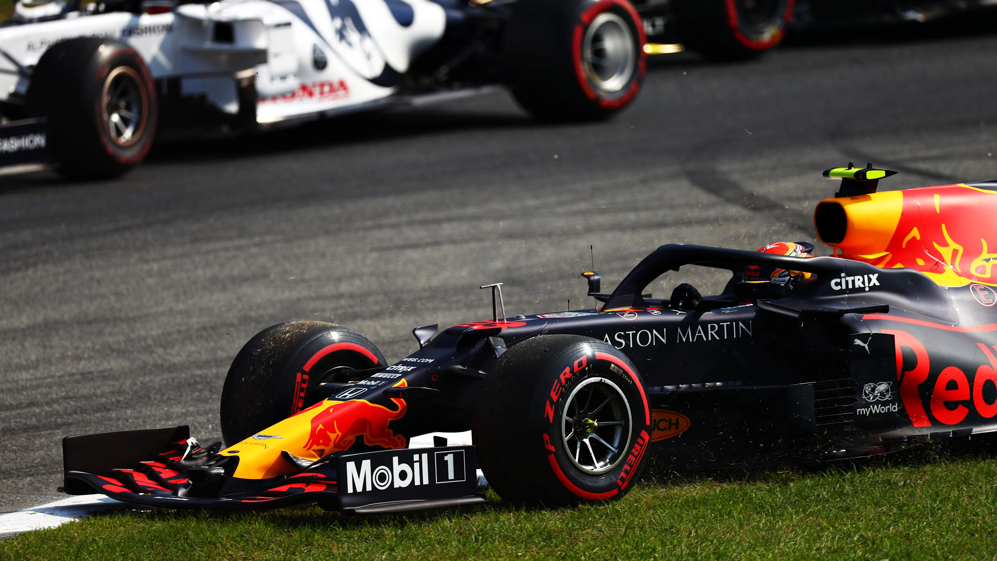 MONZA, ITALY - SEPTEMBER 06: Alexander Albon of Thailand driving the (23) Aston Martin Red Bull Racing RB16 runs wide during the F1 Grand Prix of Italy at Autodromo di Monza on September 06, 2020 in Monza, Italy. (Photo by Dan Istitene - Formula 1/Formula 1 via Getty Images)