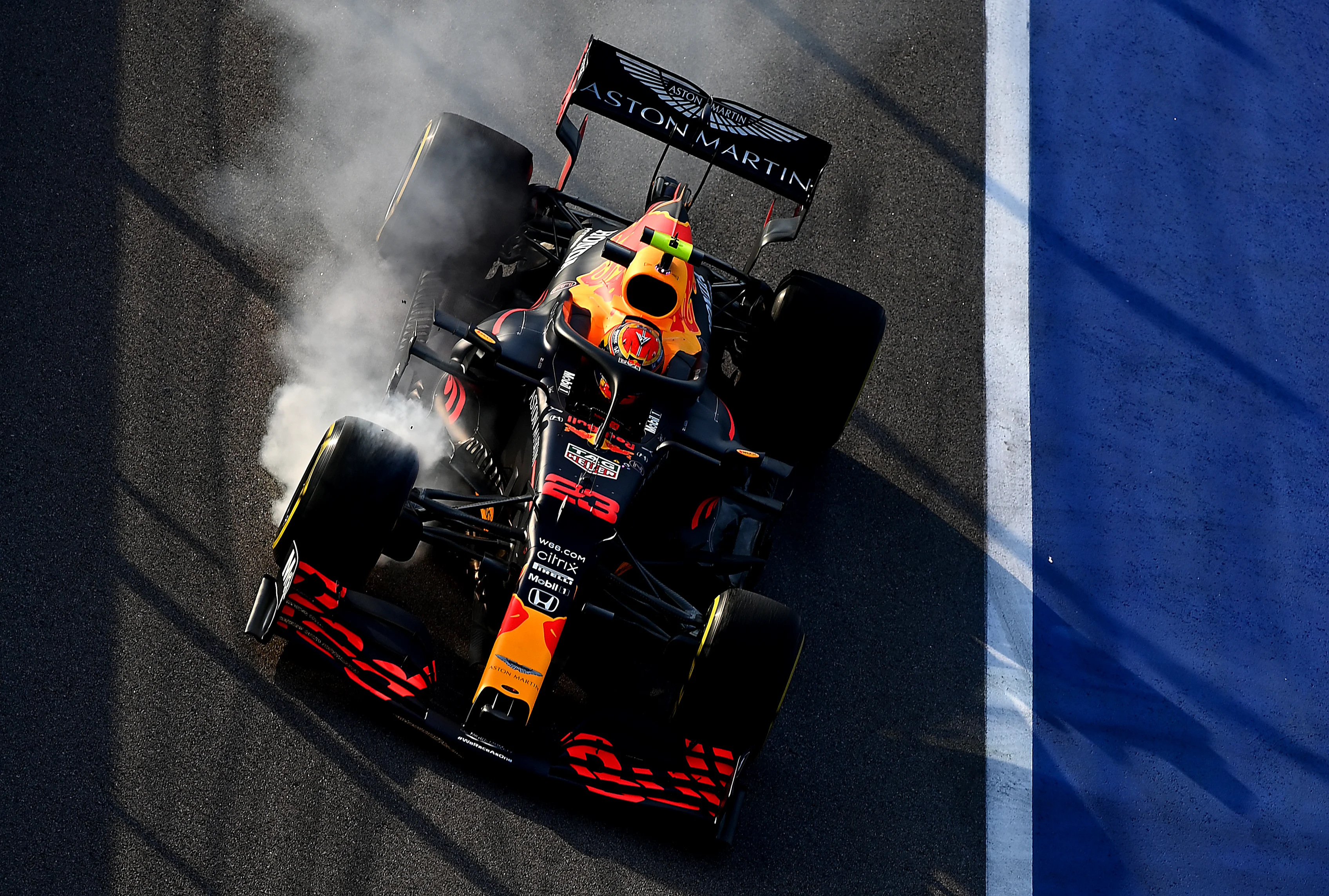 SOCHI, RUSSIA - SEPTEMBER 25: Alexander Albon of Thailand driving the (23) Aston Martin Red Bull Racing RB16 locks a wheel under braking during practice ahead of the F1 Grand Prix of Russia at Sochi Autodrom on September 25, 2020 in Sochi, Russia. (Photo by Clive Mason - Formula 1/Formula 1 via Getty Images)