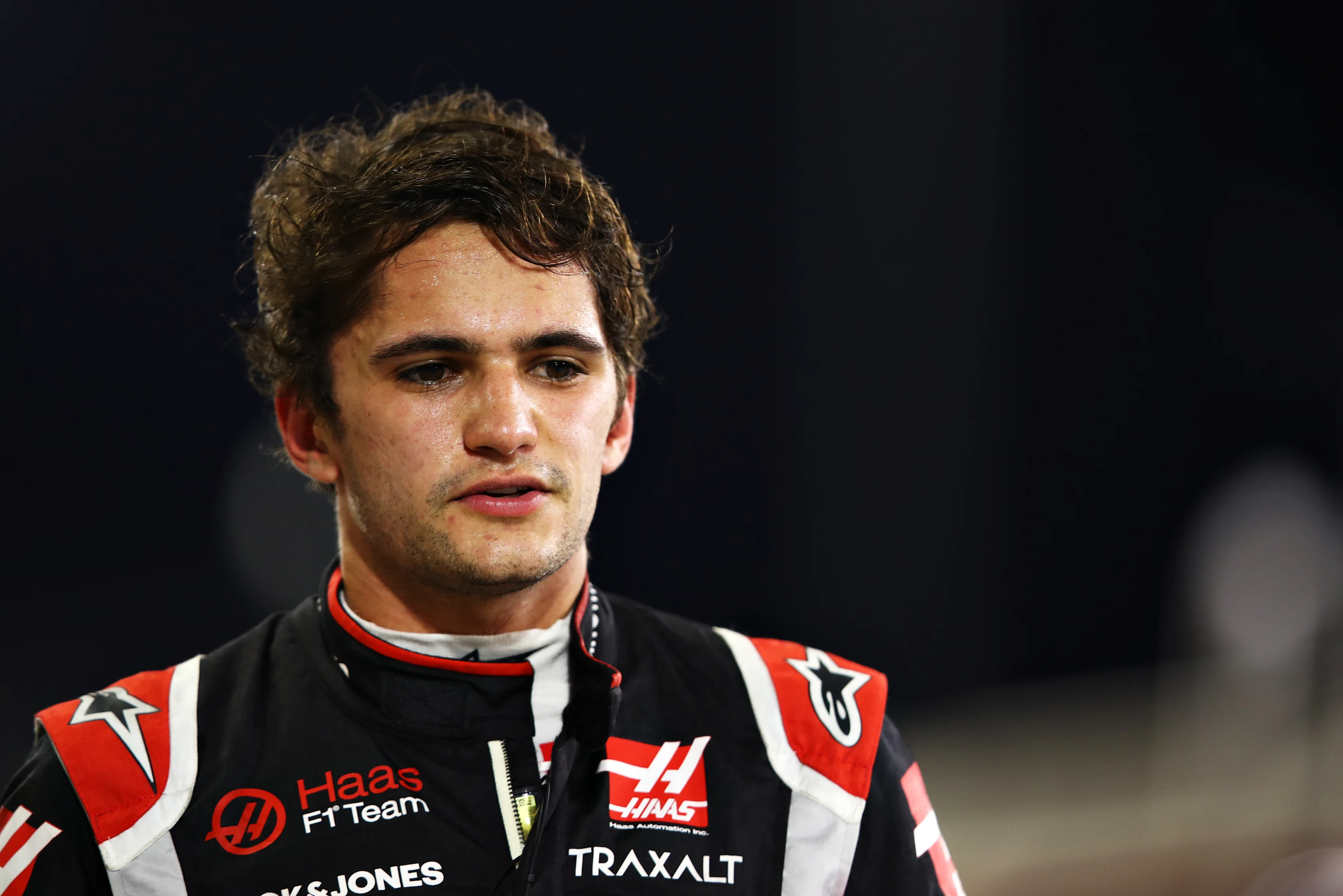 BAHRAIN, BAHRAIN - DECEMBER 04: Pietro Fittipaldi of Brazil and Haas F1 walks in the Pitlane after