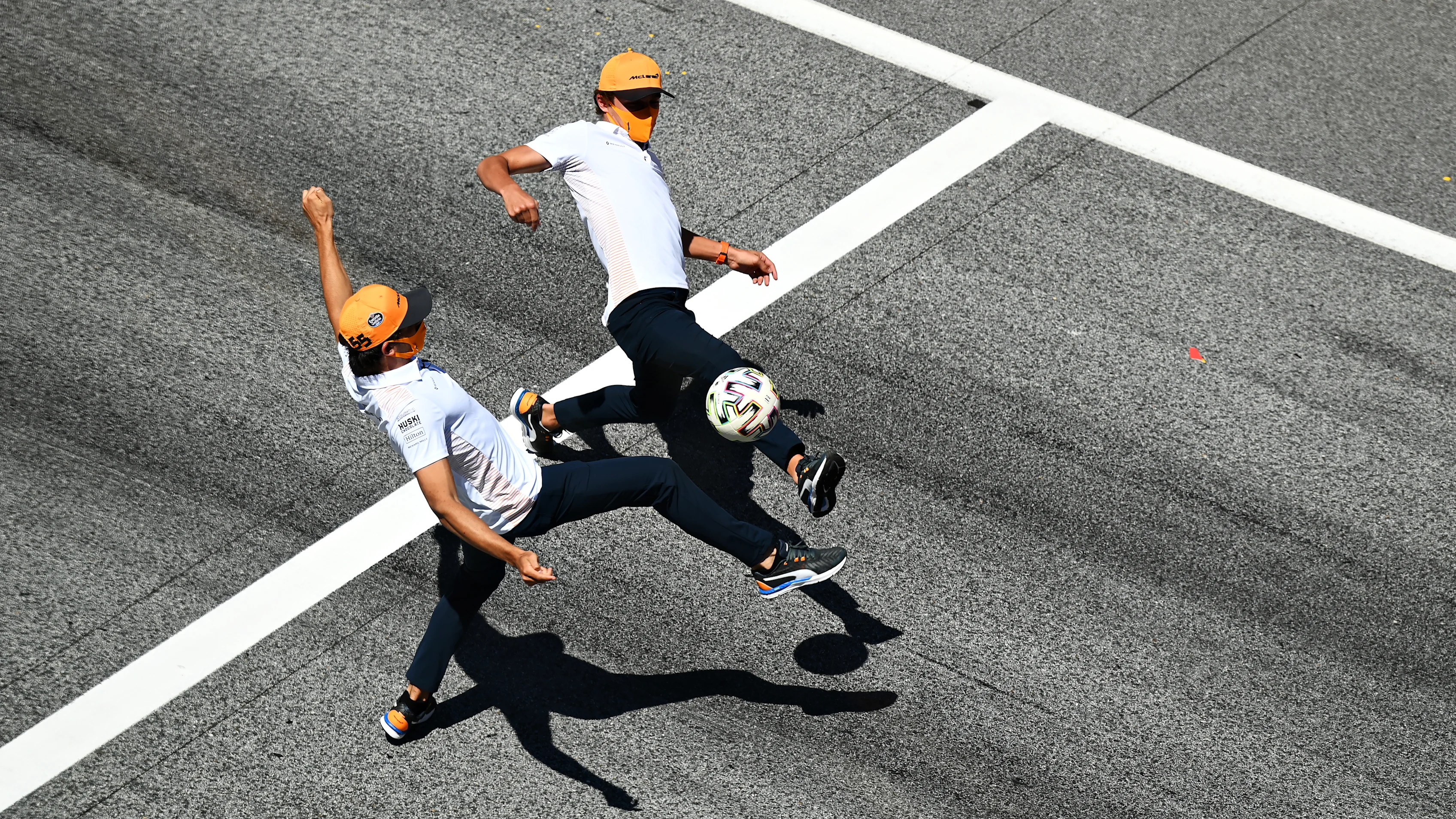 SPIELBERG, AUSTRIA - JULY 09: Lando Norris of Great Britain and McLaren F1 and Carlos Sainz of