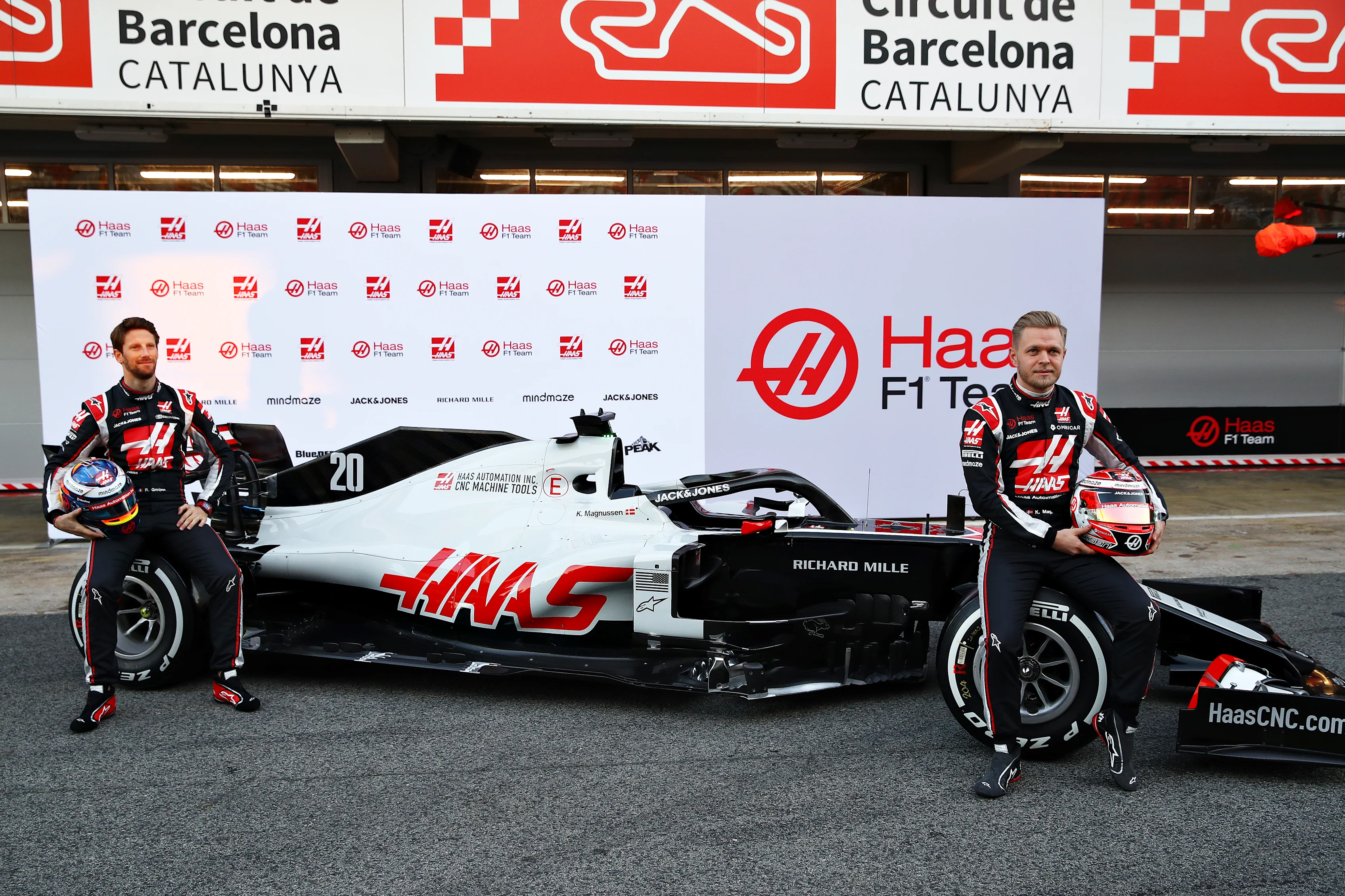 BARCELONA, SPAIN - FEBRUARY 19: Romain Grosjean of France and Haas F1 and Kevin Magnussen of