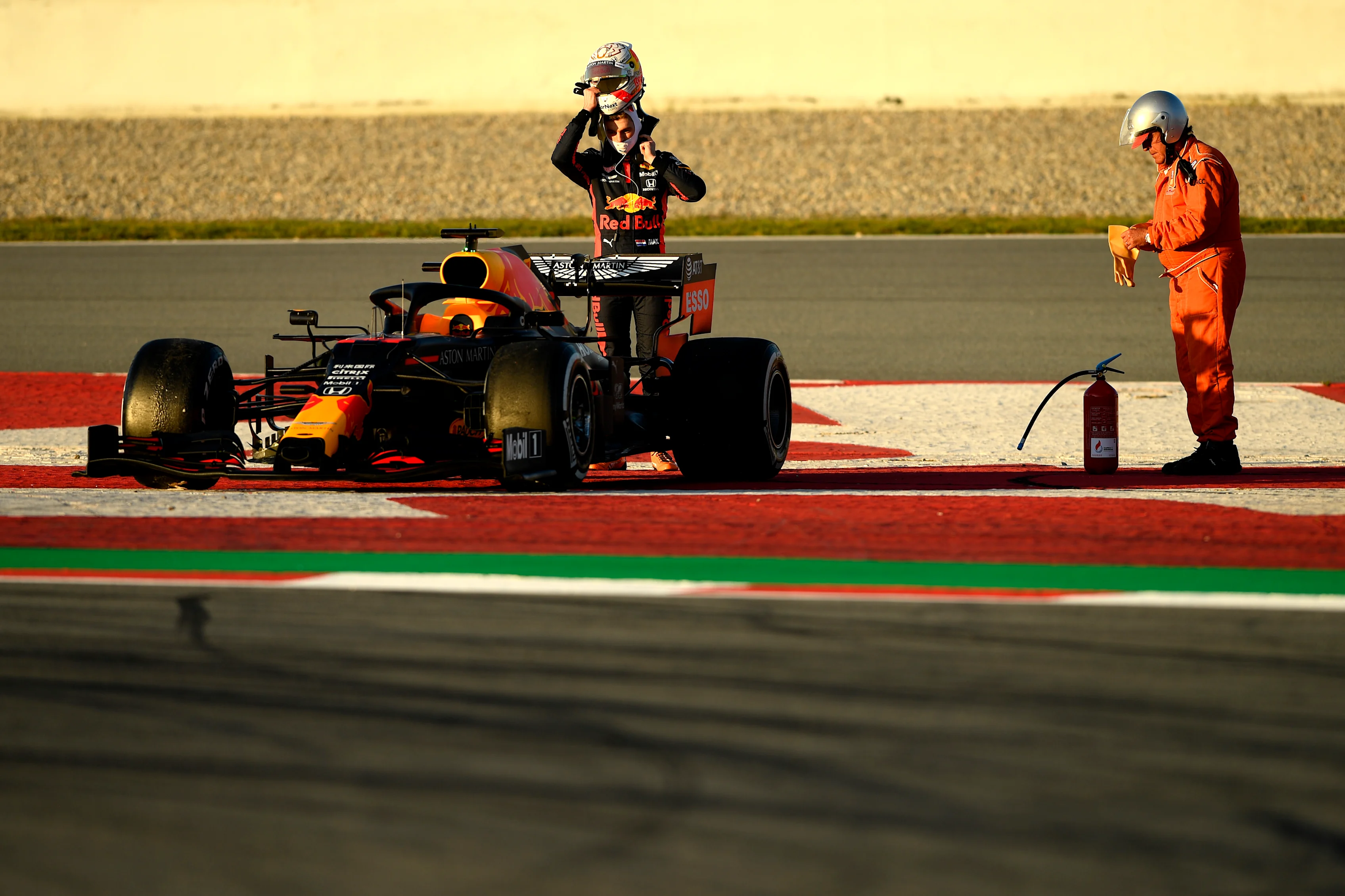 BARCELONA, SPAIN - FEBRUARY 26: Max Verstappen of Netherlands and Red Bull Racing stops on the