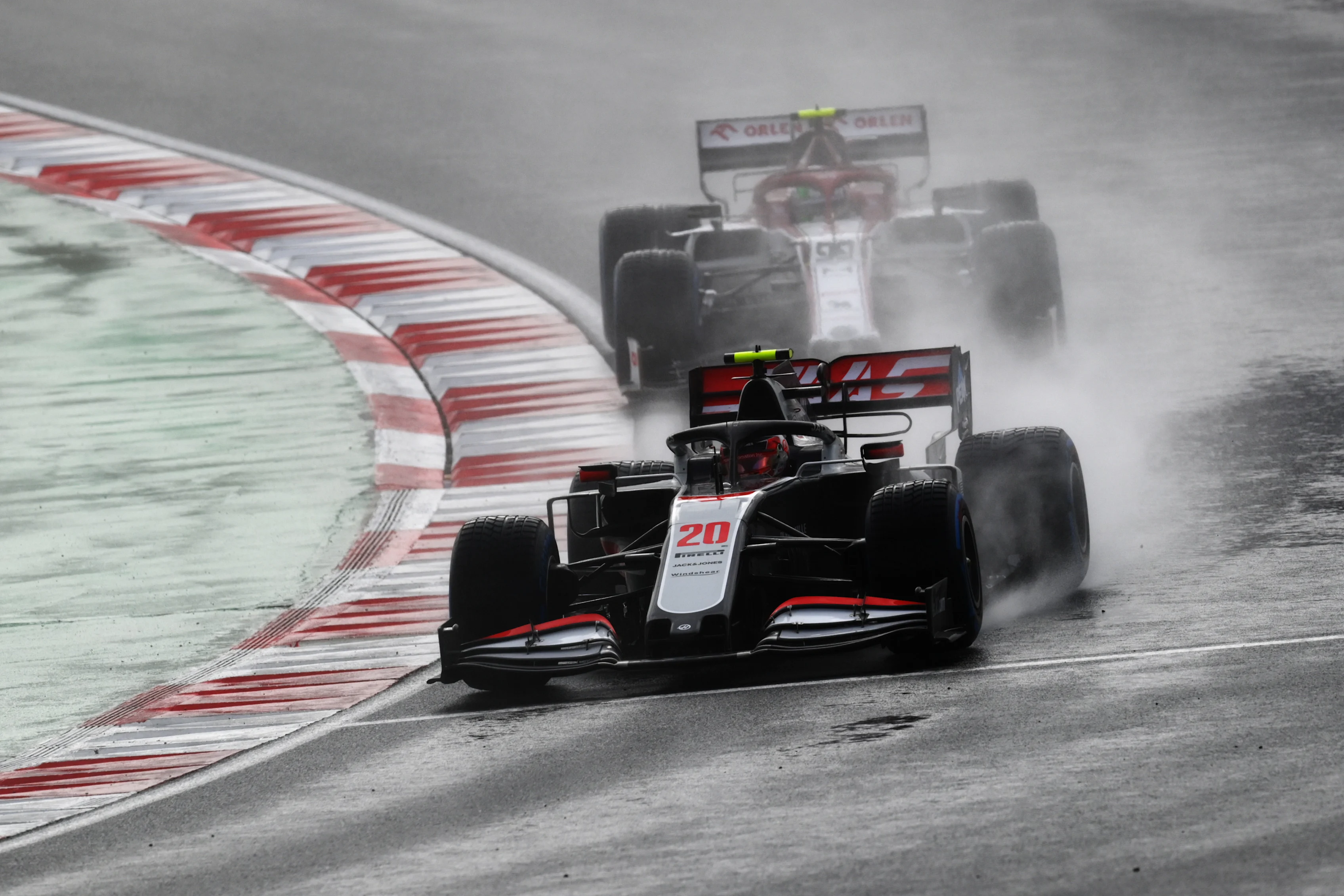 ISTANBUL, TURKEY - NOVEMBER 15: Kevin Magnussen of Denmark driving the (20) Haas F1 Team VF-20 Ferrari leads Antonio Giovinazzi of Italy driving the (99) Alfa Romeo Racing C39 Ferrari during the F1 Grand Prix of Turkey at Intercity Istanbul Park on November 15, 2020 in Istanbul, Turkey. (Photo by Clive Mason/Getty Images)