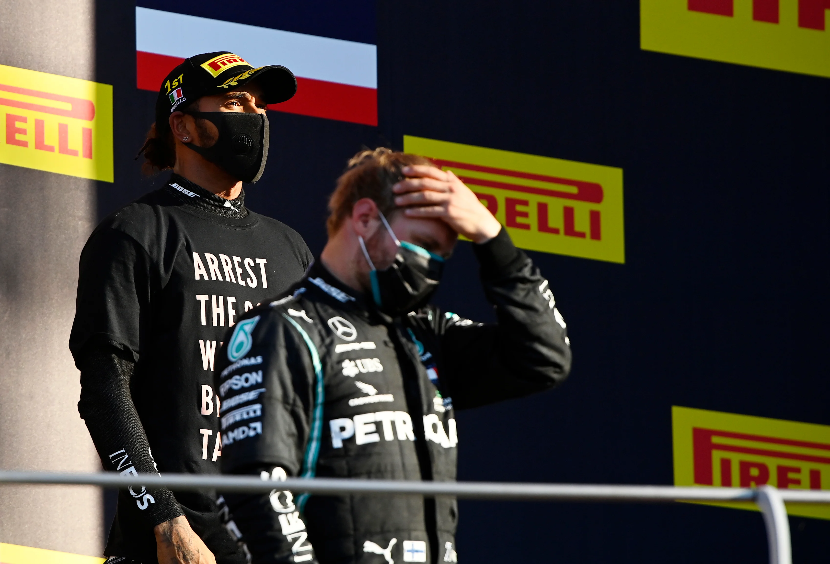 SCARPERIA, ITALY - SEPTEMBER 13: Race winner Lewis Hamilton of Great Britain and Mercedes GP stands on the podium during the F1 Grand Prix of Tuscany at Mugello Circuit on September 13, 2020 in Scarperia, Italy. (Photo by Rudy Carezzevoli/Getty Images)
