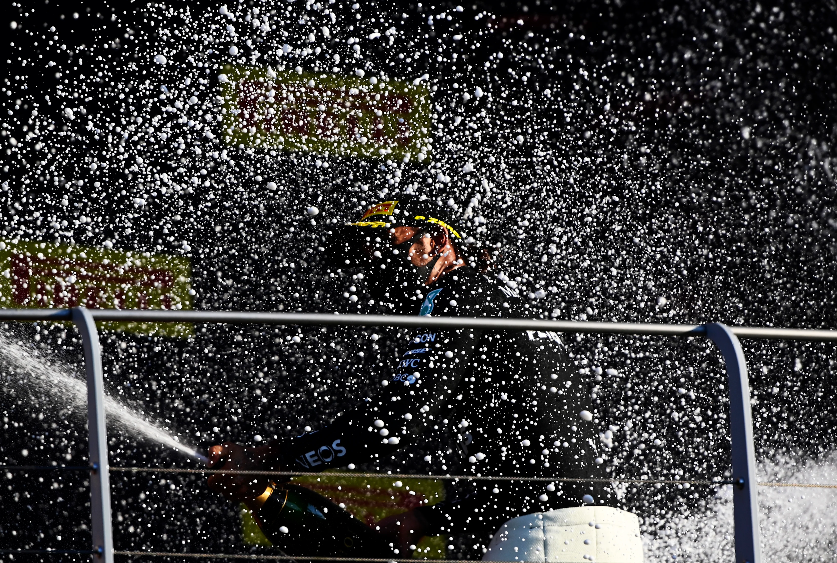 SCARPERIA, ITALY - SEPTEMBER 13: Race winner Lewis Hamilton of Great Britain and Mercedes GP