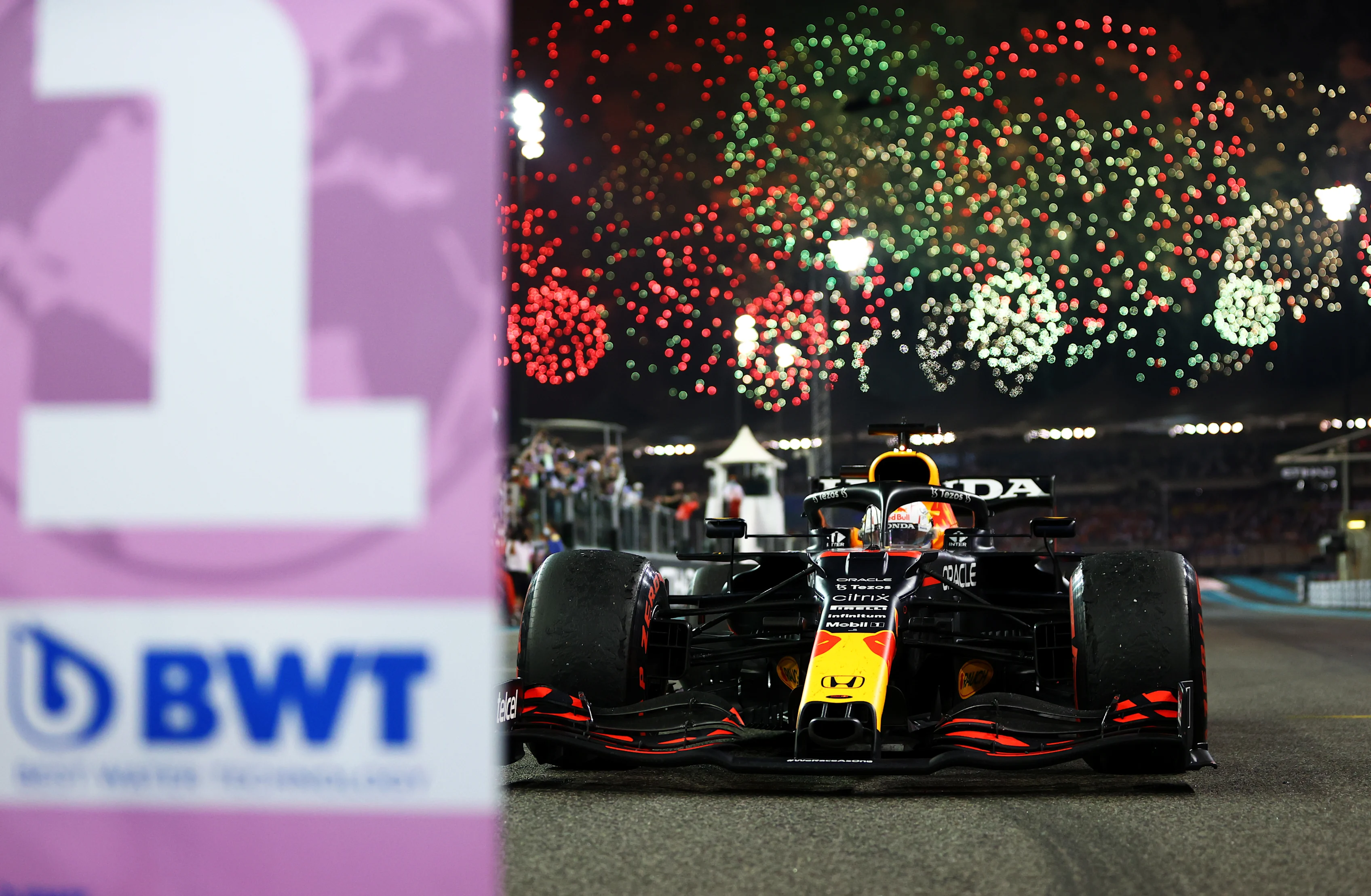 ABU DHABI, UNITED ARAB EMIRATES - DECEMBER 12: Race winner and 2021 F1 World Drivers Champion Max