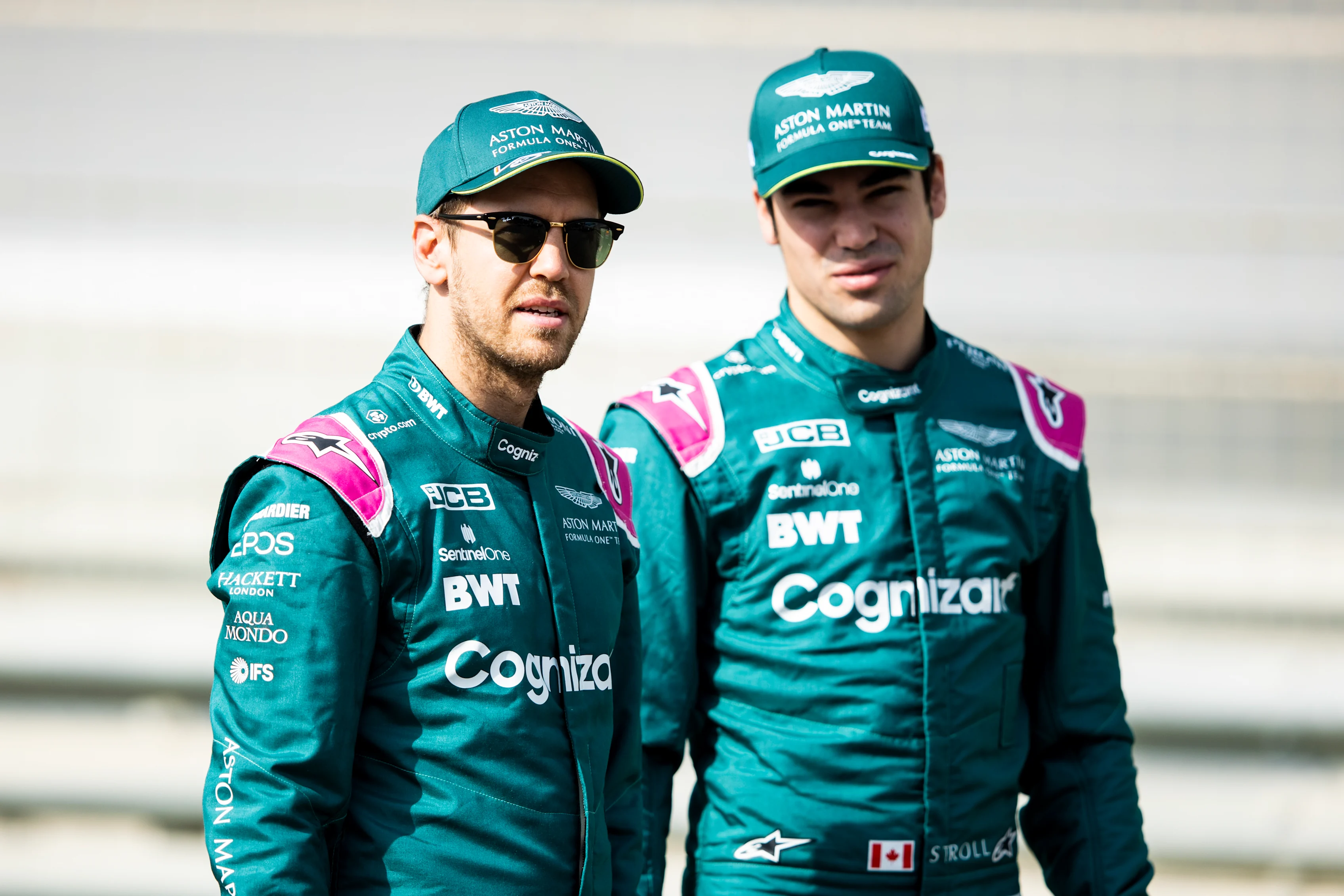 BAHRAIN, BAHRAIN - MARCH 12: Sebastian Vettel of Germany and Aston Martin F1 Team and Lance Stroll